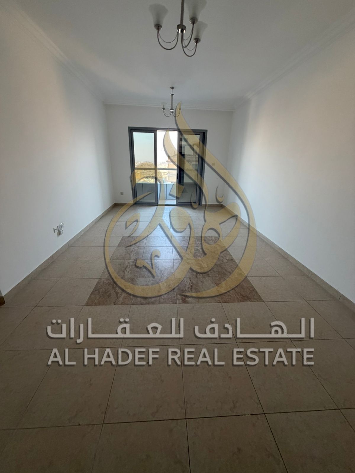 Two-bedroom apartment with a living room for annual rent in Sharjah, Al Taawun area, with free gym, free swimming pool, and free parking for the car.