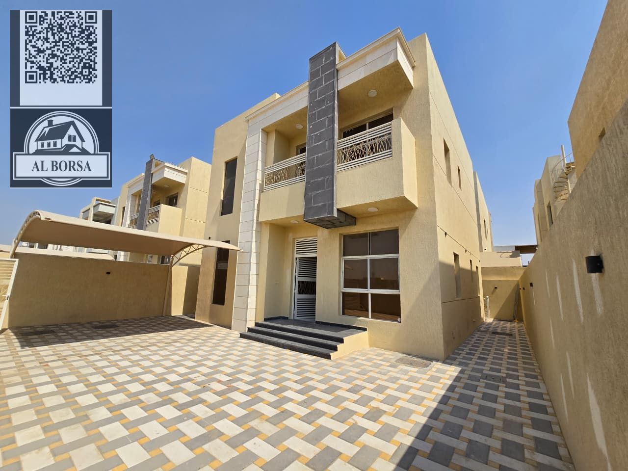 Villa for rent in Al Yasmin, 3 master bedrooms, living room, majlis, large yard, and maid's room. 85,000 AED.