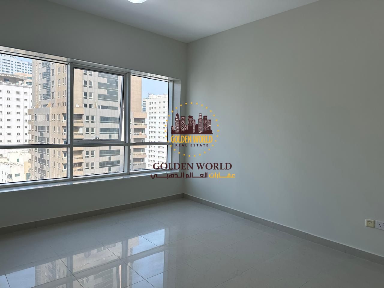 Spacious Three-Bedroom Apartment with Full Panorama View, Partial Sea View, Free AC, Robotic Parking, and Full Facilities in a Prime Sharjah Location