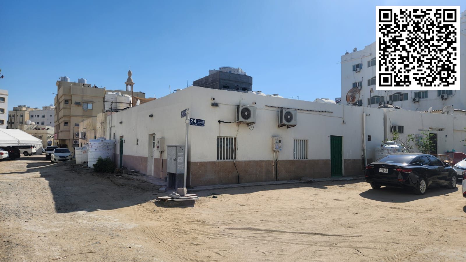 Traditional Arabic house for sale in Al Bustan, Ajman Residential/Investment Land area 2000 sq ft Corner plot on two streets Divided into two houses w