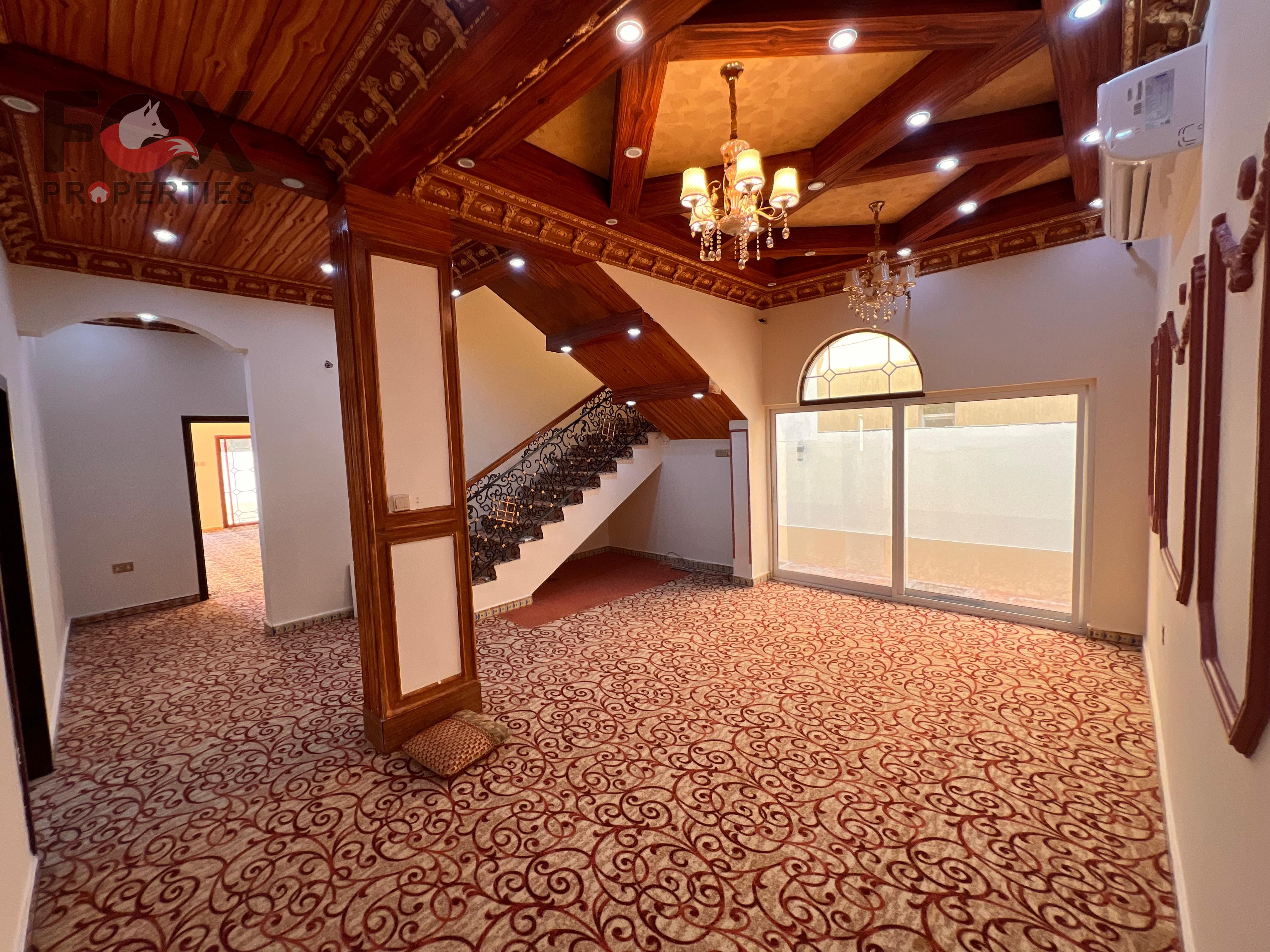 6 bedrooms | Spacious majlis + large living room | Elegant outdoor sitting area | Indoor shaded parking | Maid’s room | Balcony