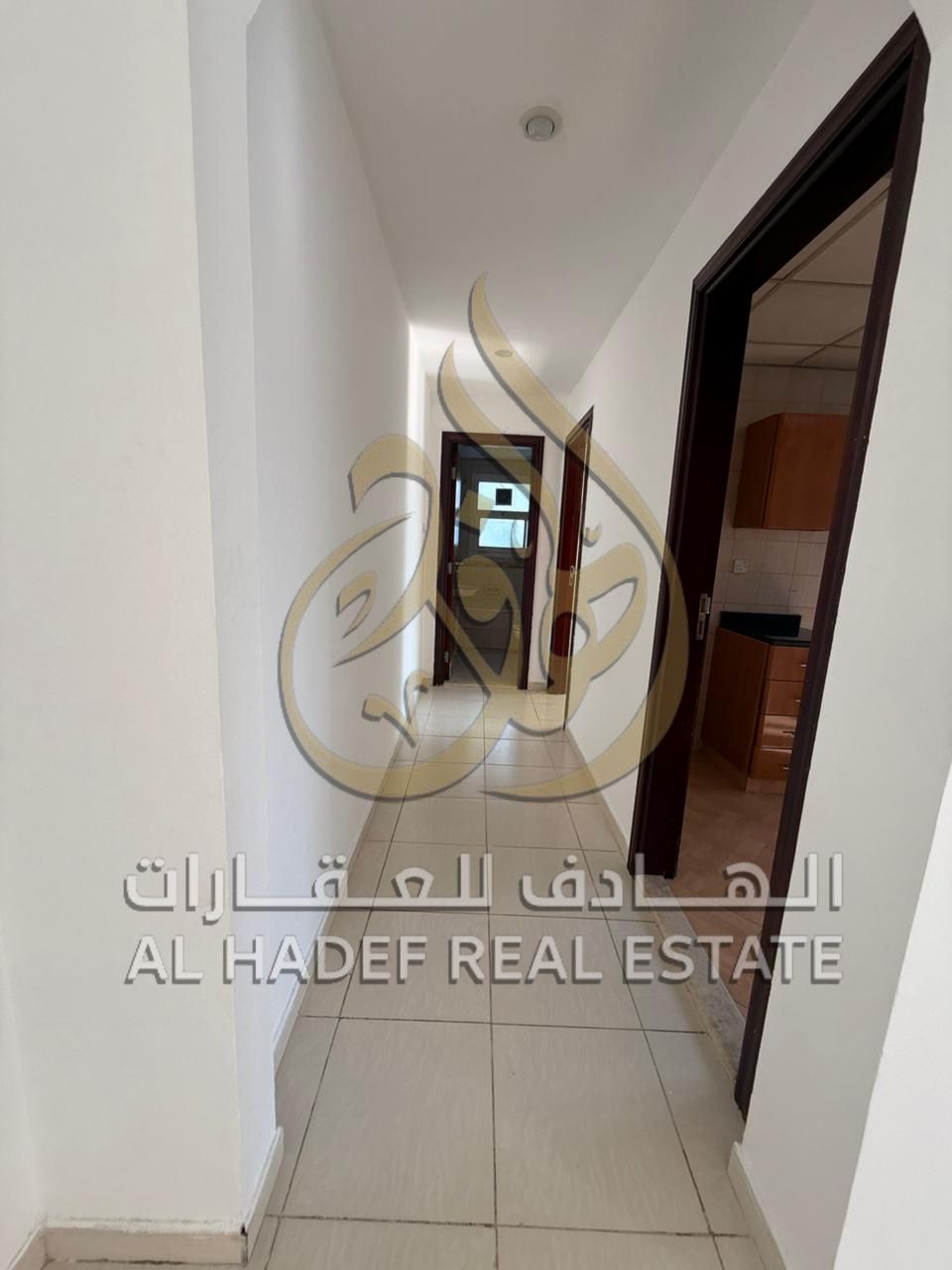 Apartment with one bedroom and a living room for annual rent in Al Majaz 3, 2 bathrooms and a balcony, free maintenance
