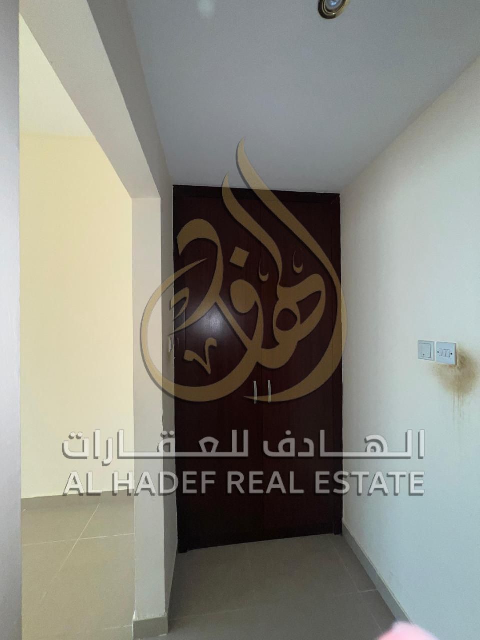For annual rent in Al Majaz 2: a 2-bedroom apartment with a living room, a master bedroom with a maid's room, 4 bathrooms, with flexible payment insta