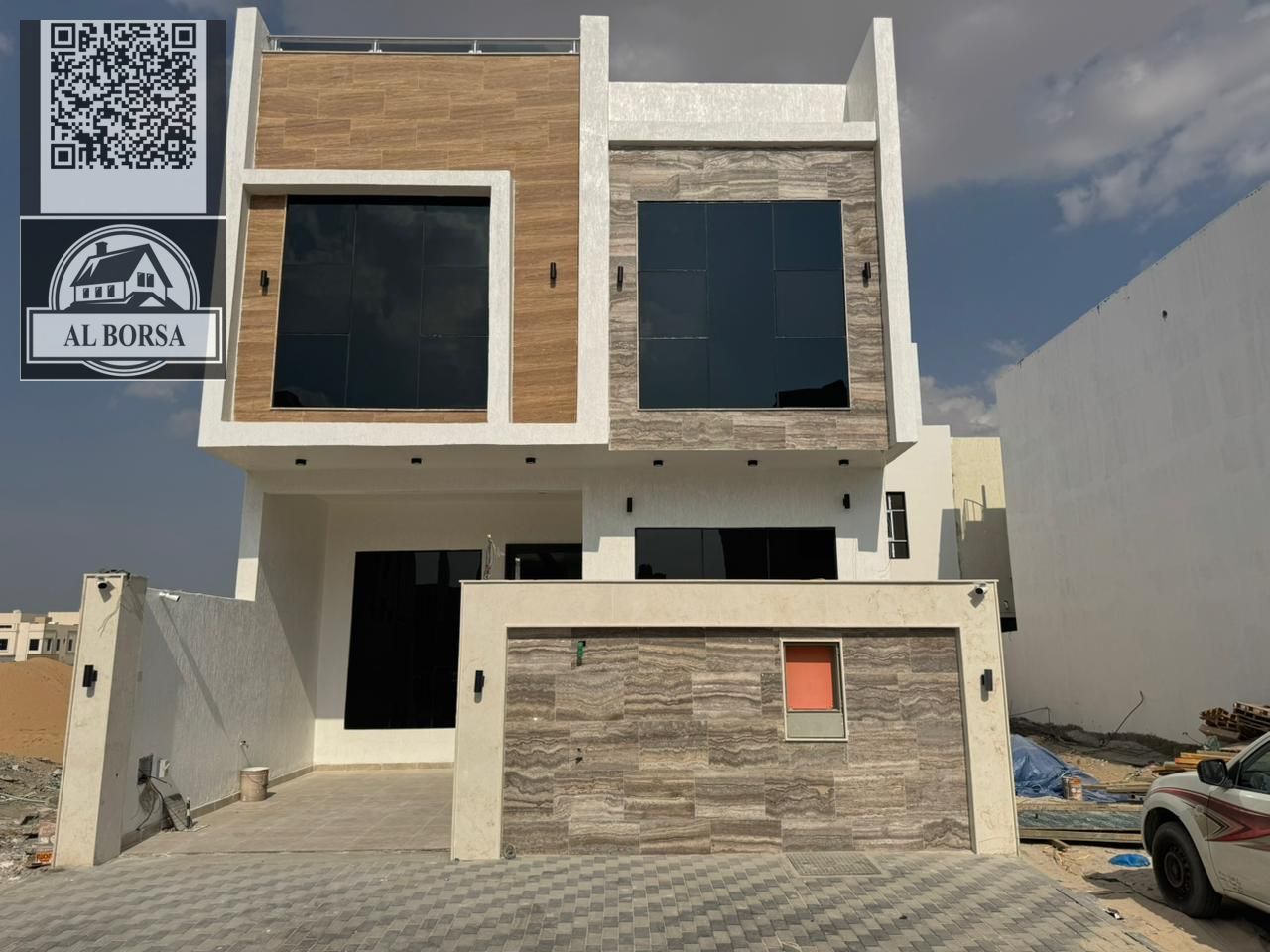 For sale in Al Bahia, Ajman: Townhouse with 4 master bedrooms, living room, majlis, and maid's room