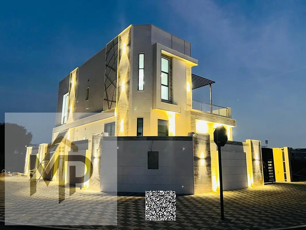 A luxury corner villa is for sale in Al Helio 2, Ajman. Registration fees are included in the price.