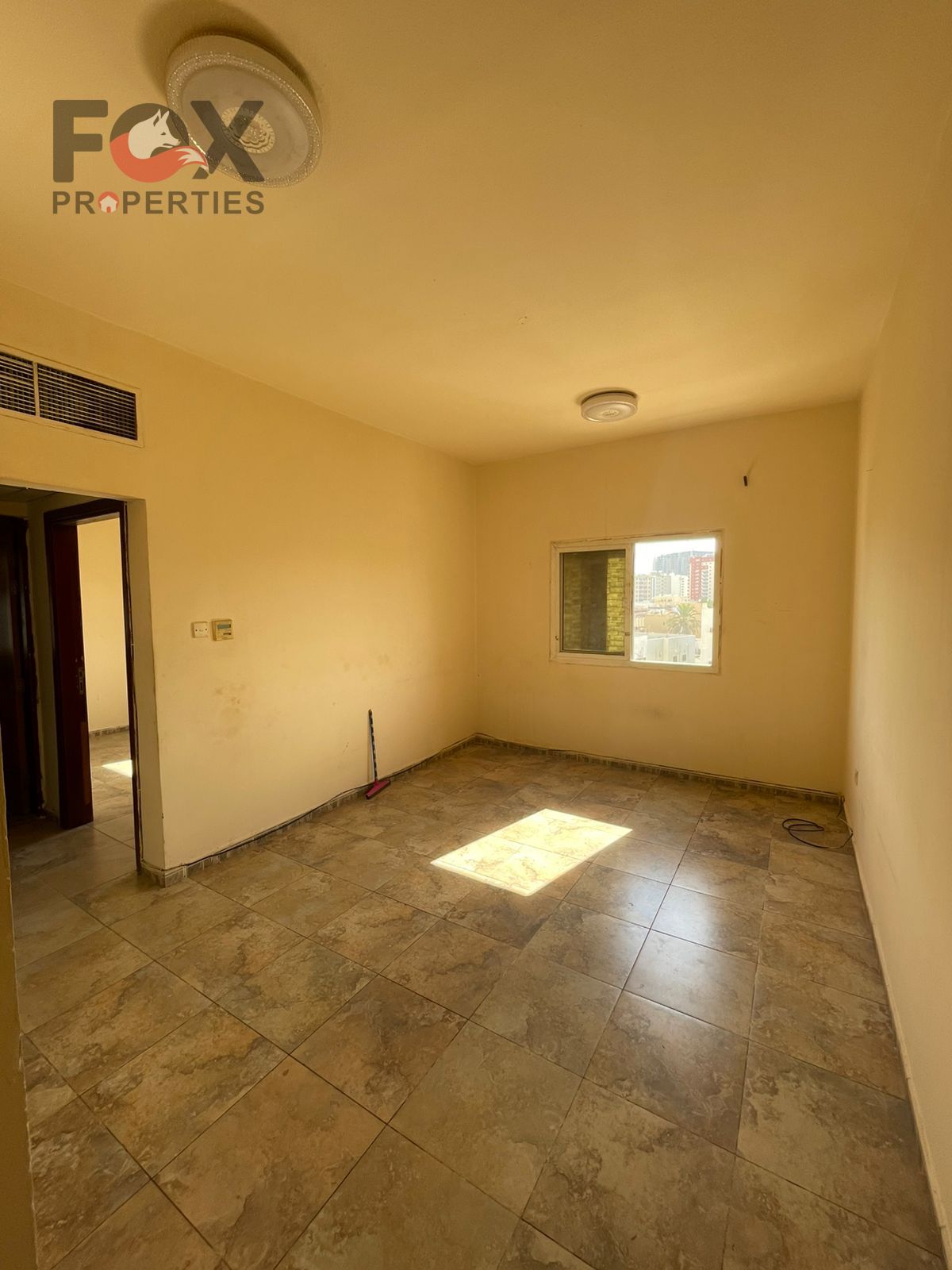Cheapest one-bedroom apartment for annual rent in Ajman, central air conditioning, Al Nuaimiya 1, next to Al Ain Hotel, close to all services.