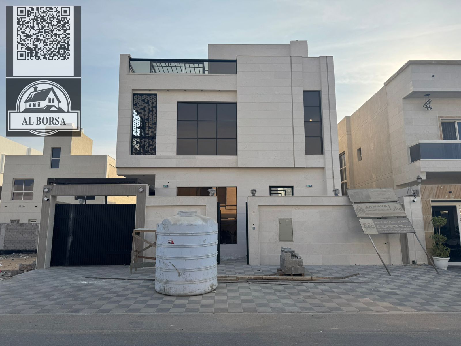 Villa for sale in Al Bahia area, Ajman. 7 master bedrooms, majlis, living room, and maid's room.