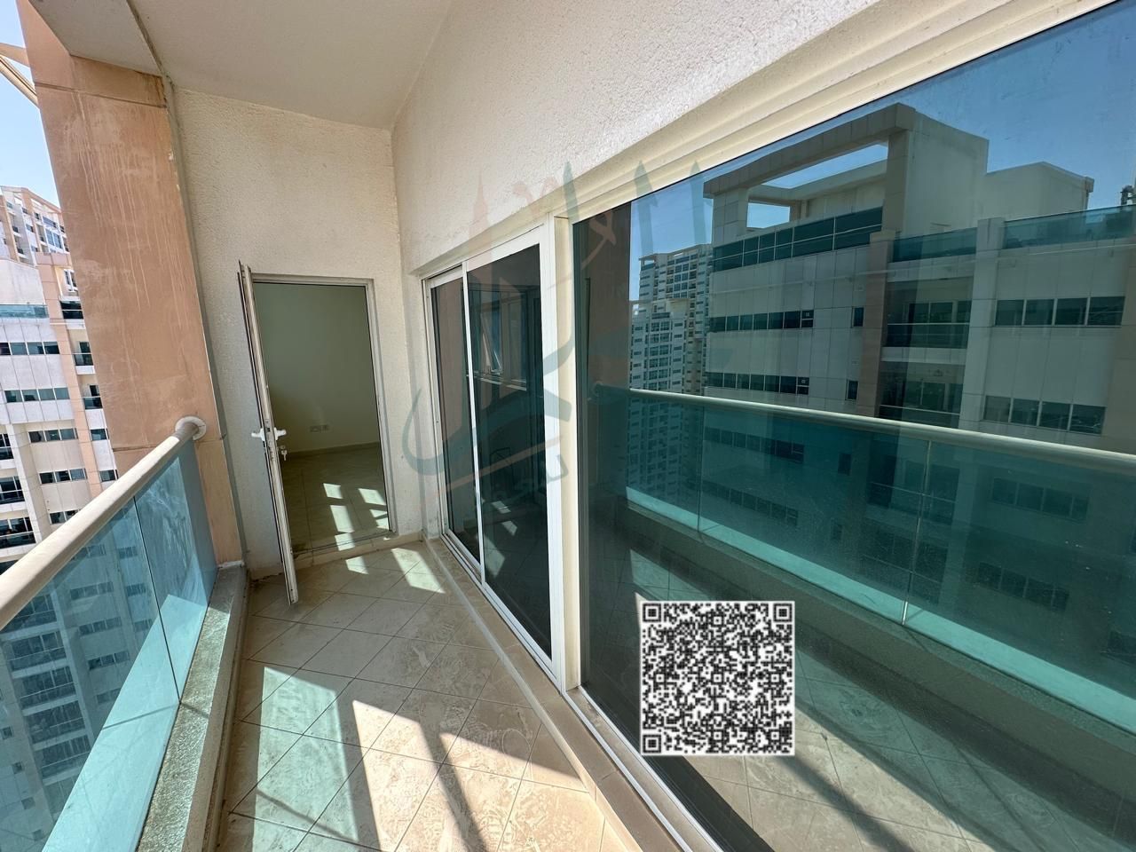 Two-bedroom apartment for sale in Ajman One Tower with a view of the city and the garden, with an affordable payment plan.