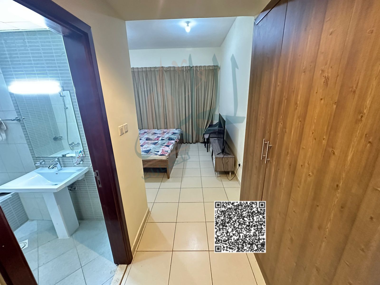 : **2-bedroom apartment with a living room for sale in Ajman One Tower with city and park views