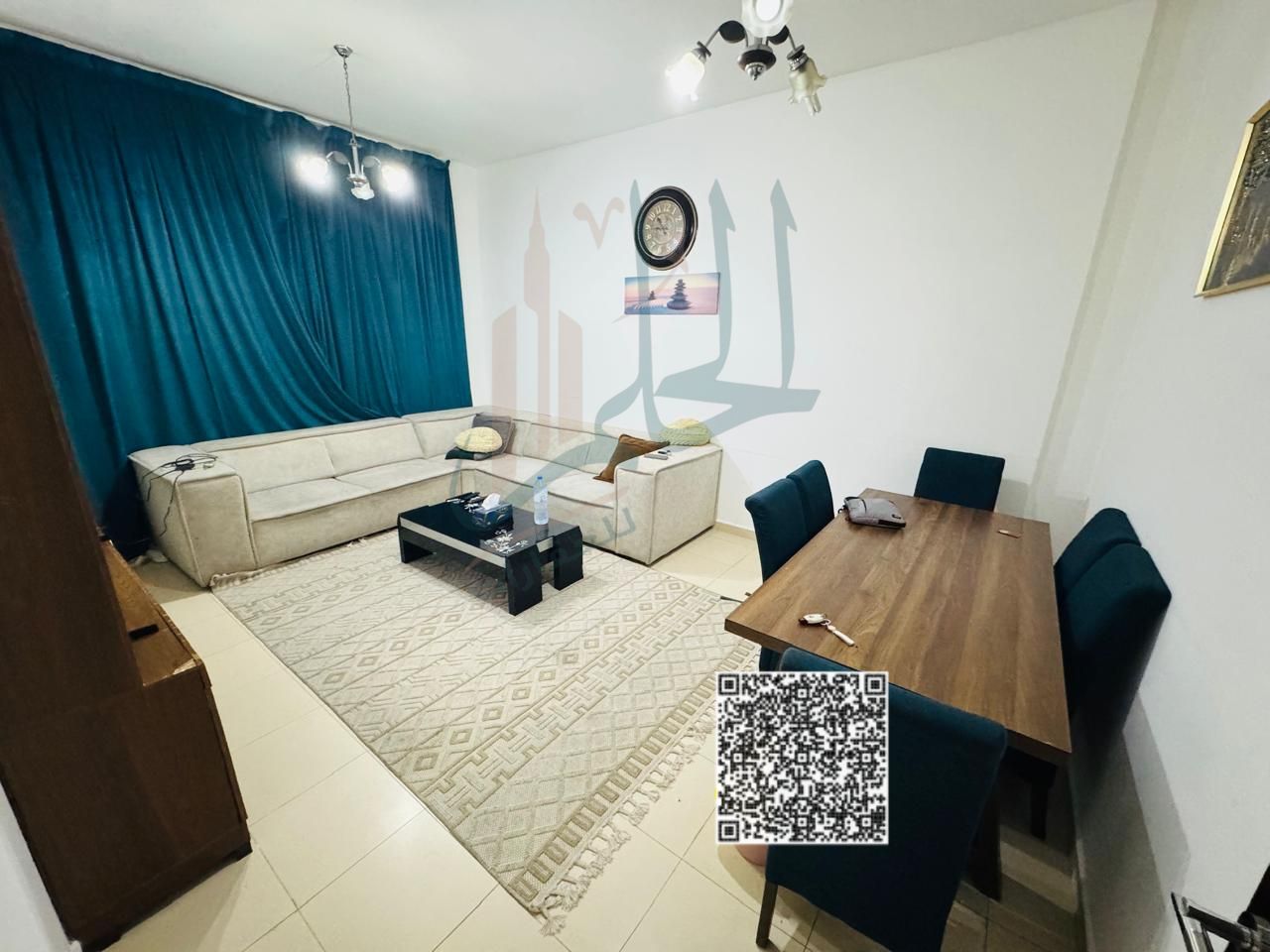 Apartment for Sale in City Tower – Ajman A resale apartment featuring two bedrooms, a spacious living room, a separate kitchen, and two bathrooms