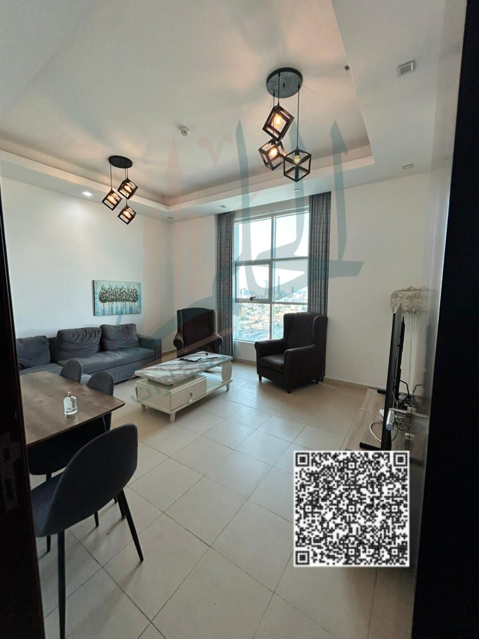 Two-Bedroom Apartment for Resale – City Tower, Ajman High-end finishing with a closed kitchen and an open view of the palace and Grand Mall.