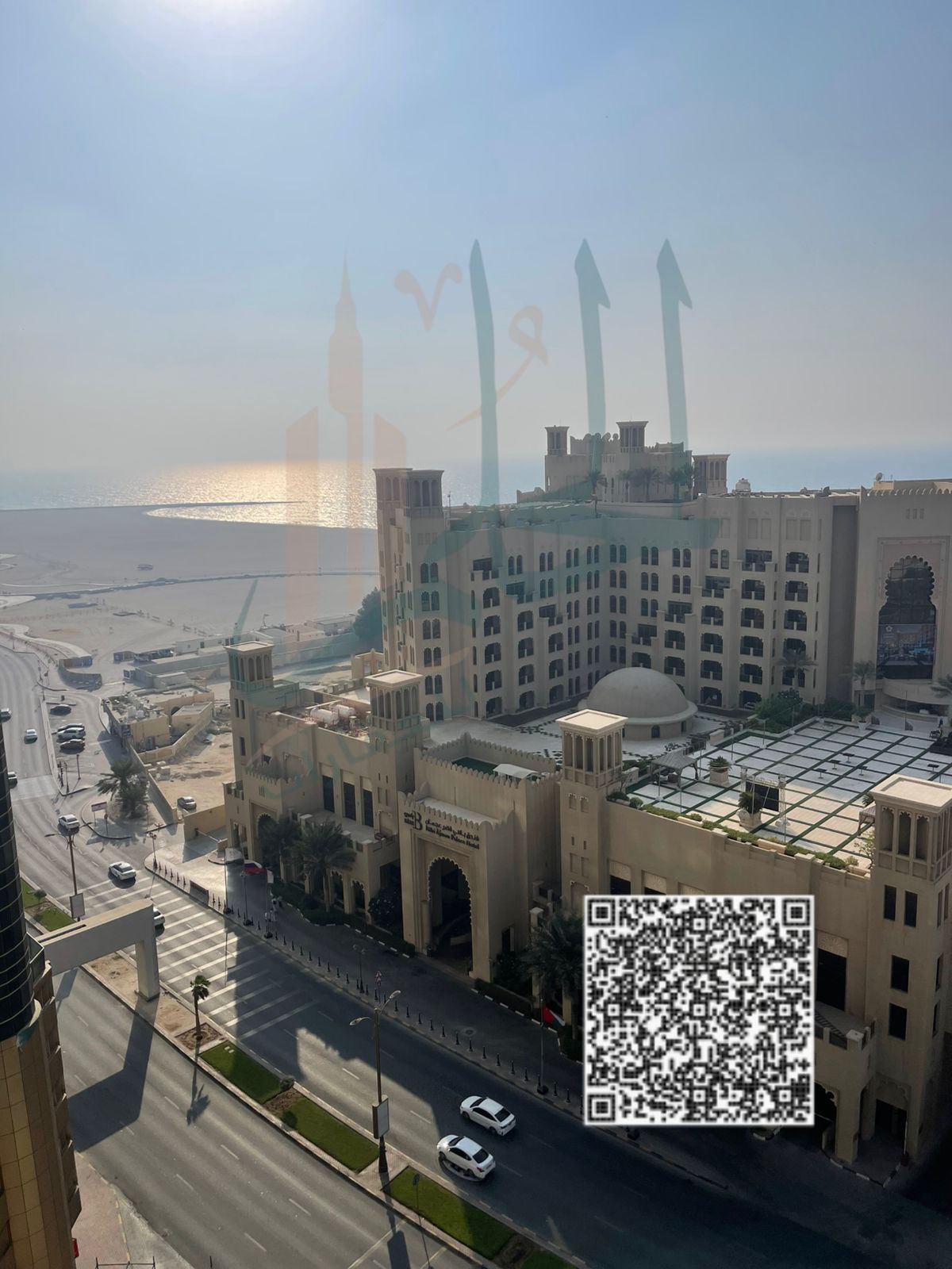 A fully furnished one-bedroom apartment for monthly rent in the Etihad Tower - Al Nakheel 2 area, in an exceptional location opposite the Bahi