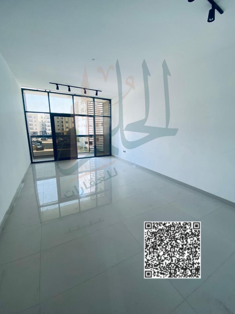 Two rooms hall, three bathrooms, first residence, with maid's room, balcony, open view, opposite Ajman Court, families only