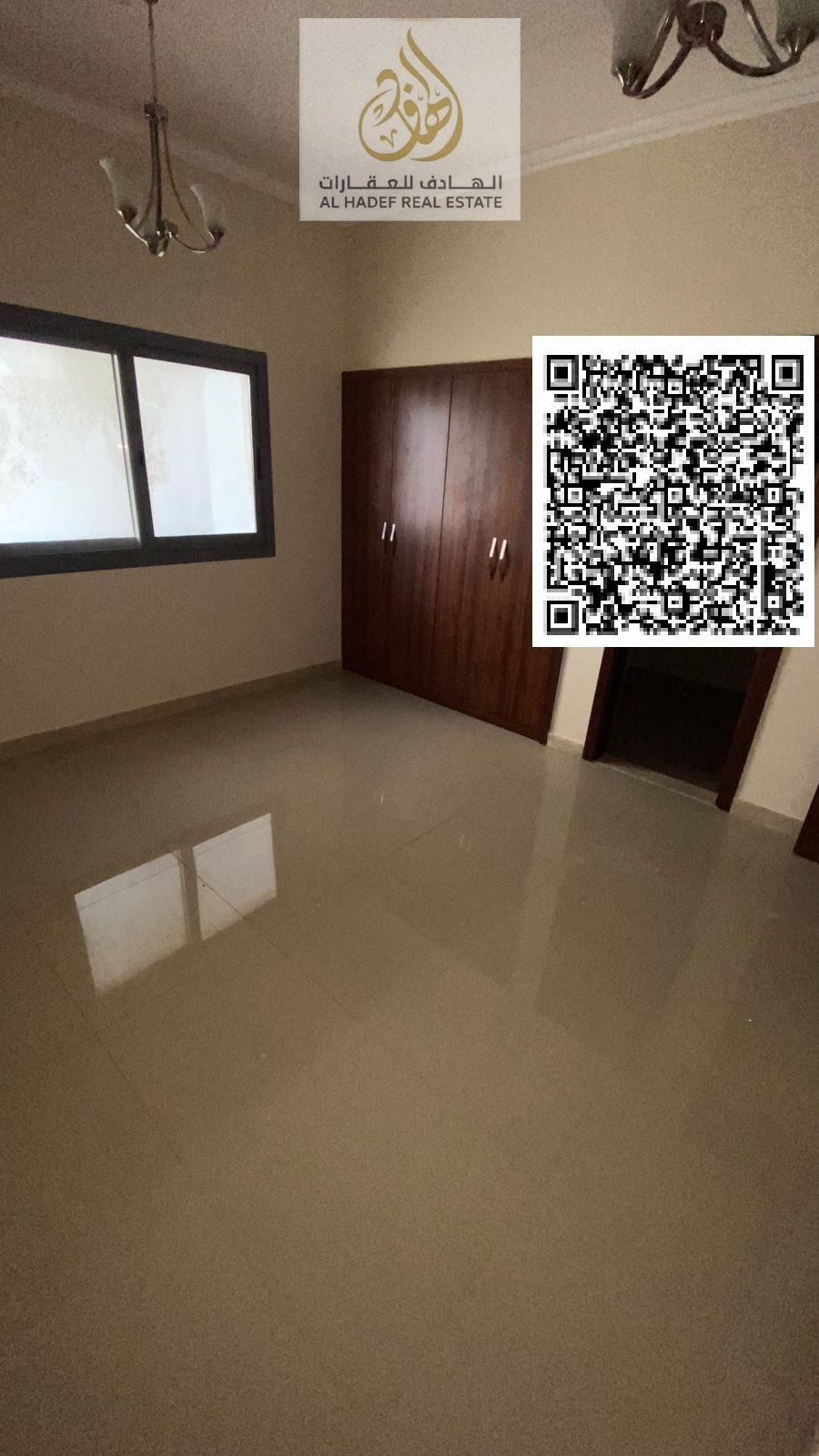 Two bedrooms and a living room with four bathrooms, a balcony, a maid's room, a laundry room, one month free, free parking, and built-in wardrobes. Pr