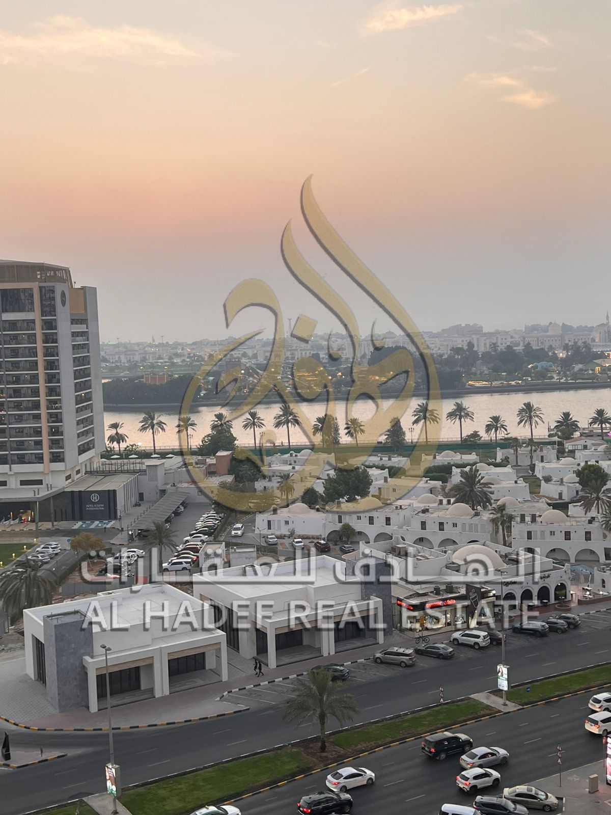 For rent in Sharjah – Al Majaz 1, a spacious 3-bedroom shared apartment ideal for bachelors, located in a clean and secure building with free maintena