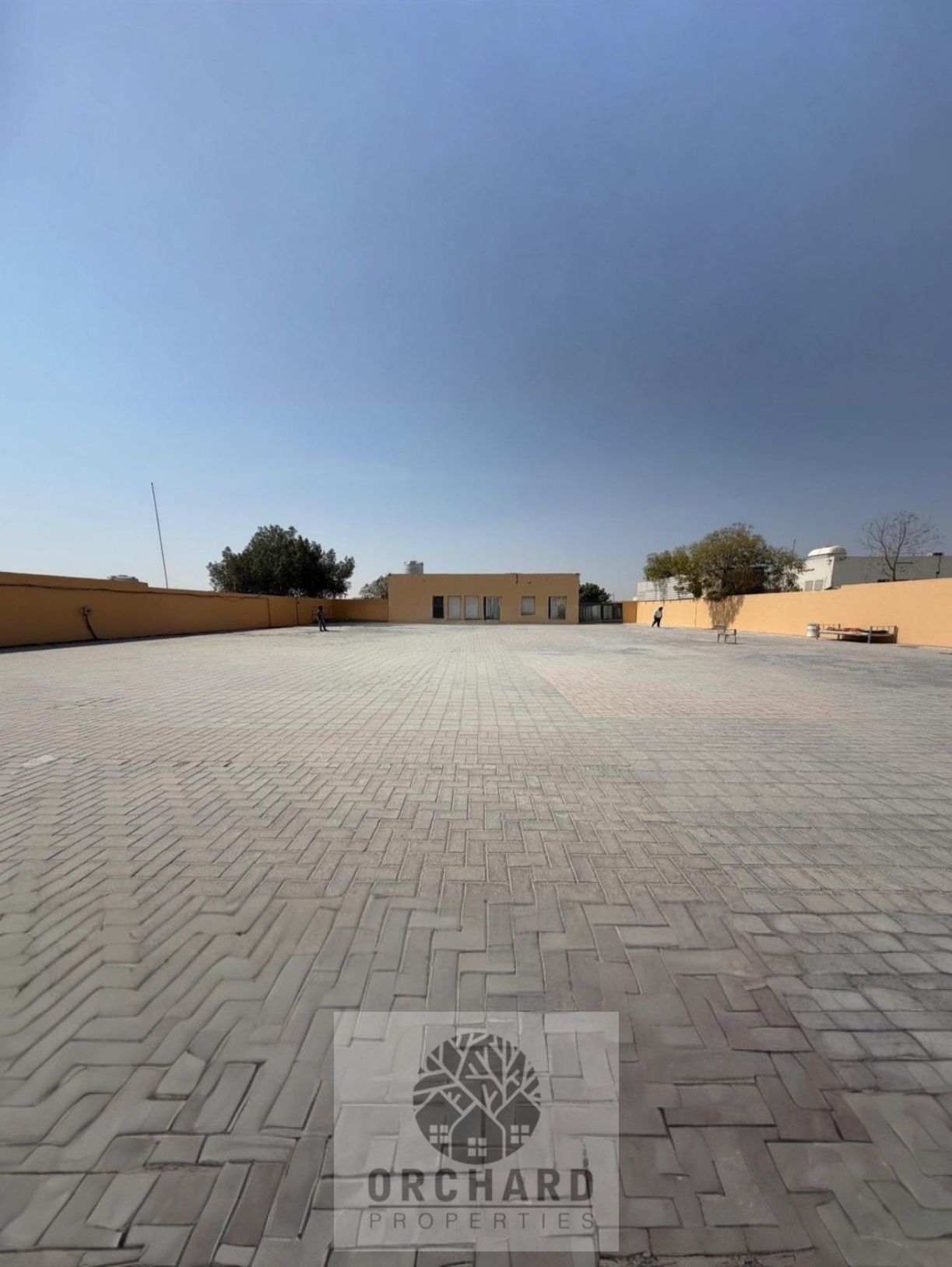 20000 SQFT OPEN YARD WITH INTERLOCK/ELECTRICITY POWER 43/2 OFFICE 1 KITCHEN 1 WASHROOM/GOOD FOR ALL ACTIVITIES/RENT 290,000 AED