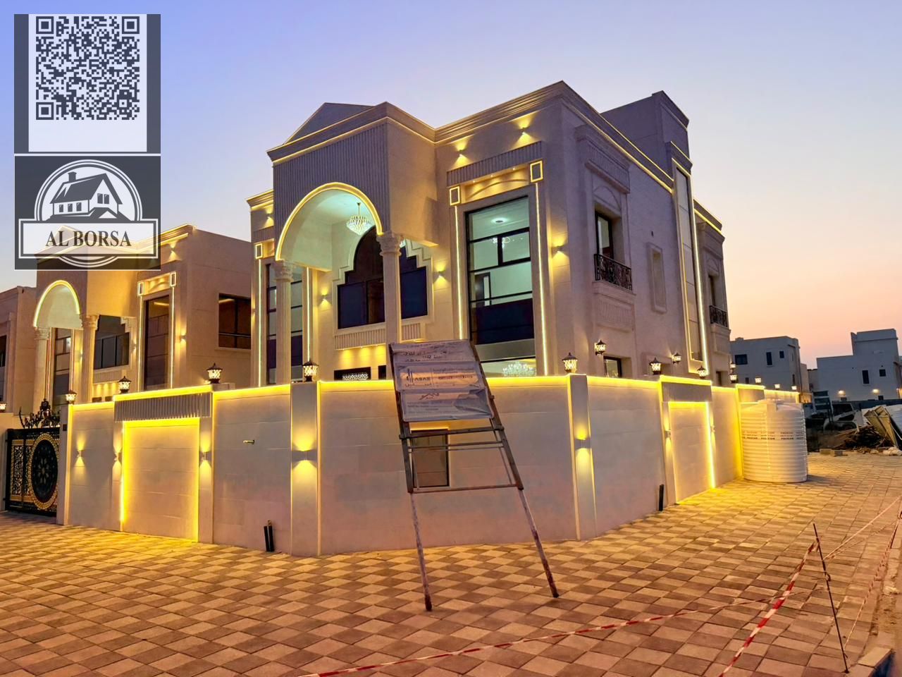 For sale in Al Helio 2, Ajman: a villa with 5 master bedrooms, a majlis, two living rooms, a spacious kitchen, and a maid's room.
