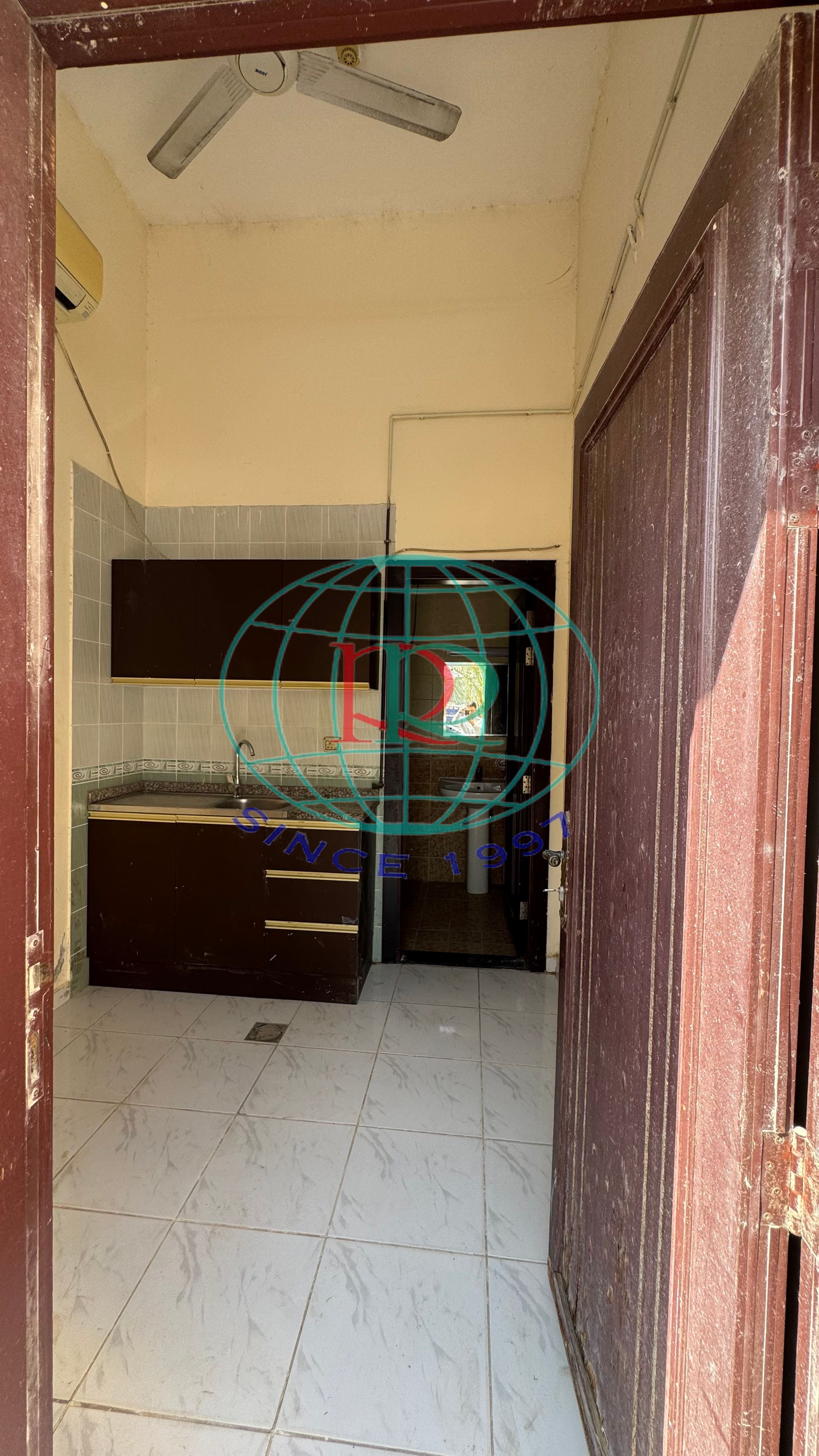 STUDIO FLAT WITH ELECTRICITY & WATER CONNECTION INCLUDED AVAILABLE IN AL MUWEILAH AREA NEAR DELTA ENGLISH SCHOOL