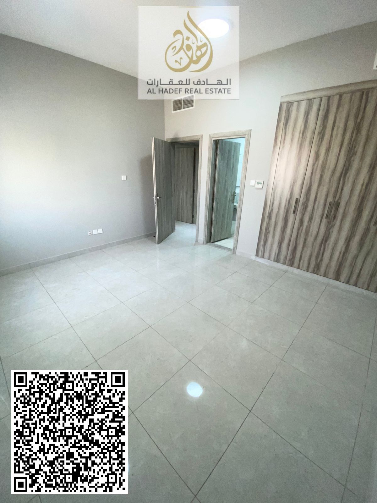 Two bedrooms and a living room with a balcony, three bathrooms, and built-in wardrobes.