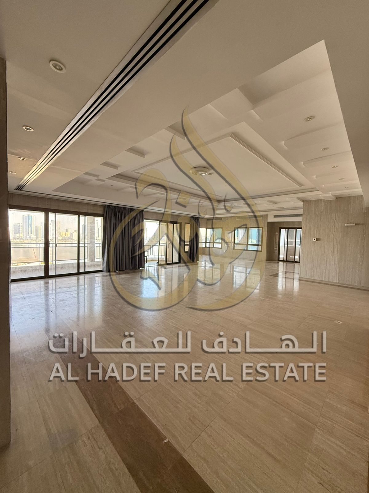 Luxury penthouse in Al Majaz, 3-5 bedrooms, living room with roof and full sea view