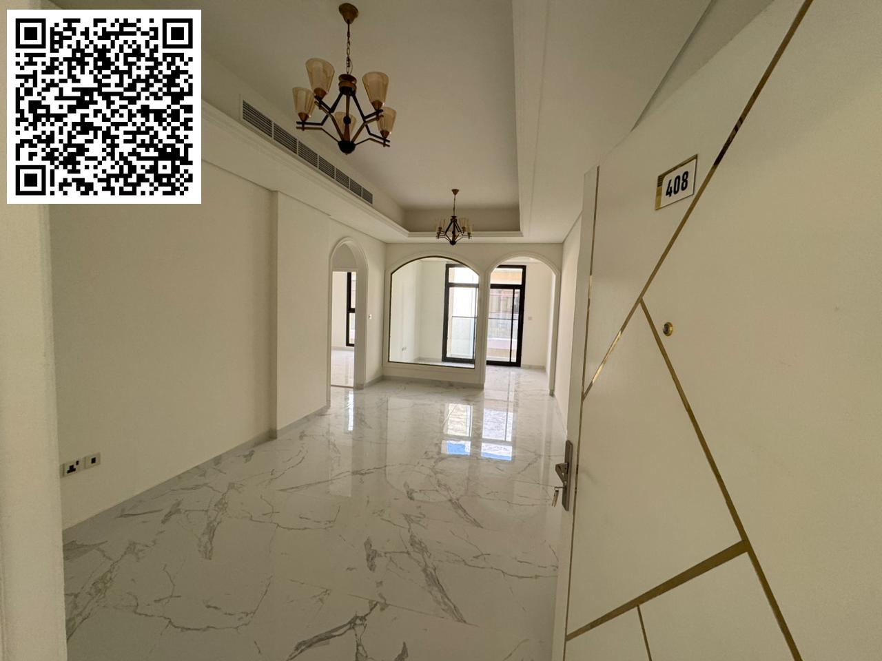 One month free, free swimming pool, built-in wardrobes, two bedrooms, living room with majlis, two bathrooms, central air conditioning, balcony with o
