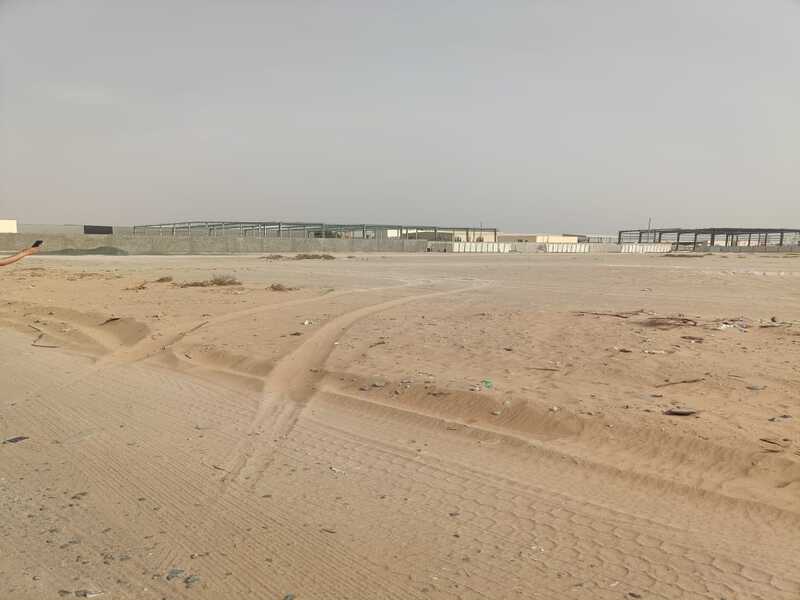 Land for sale in Al-Arqoub area, measuring 47,000 square feet.