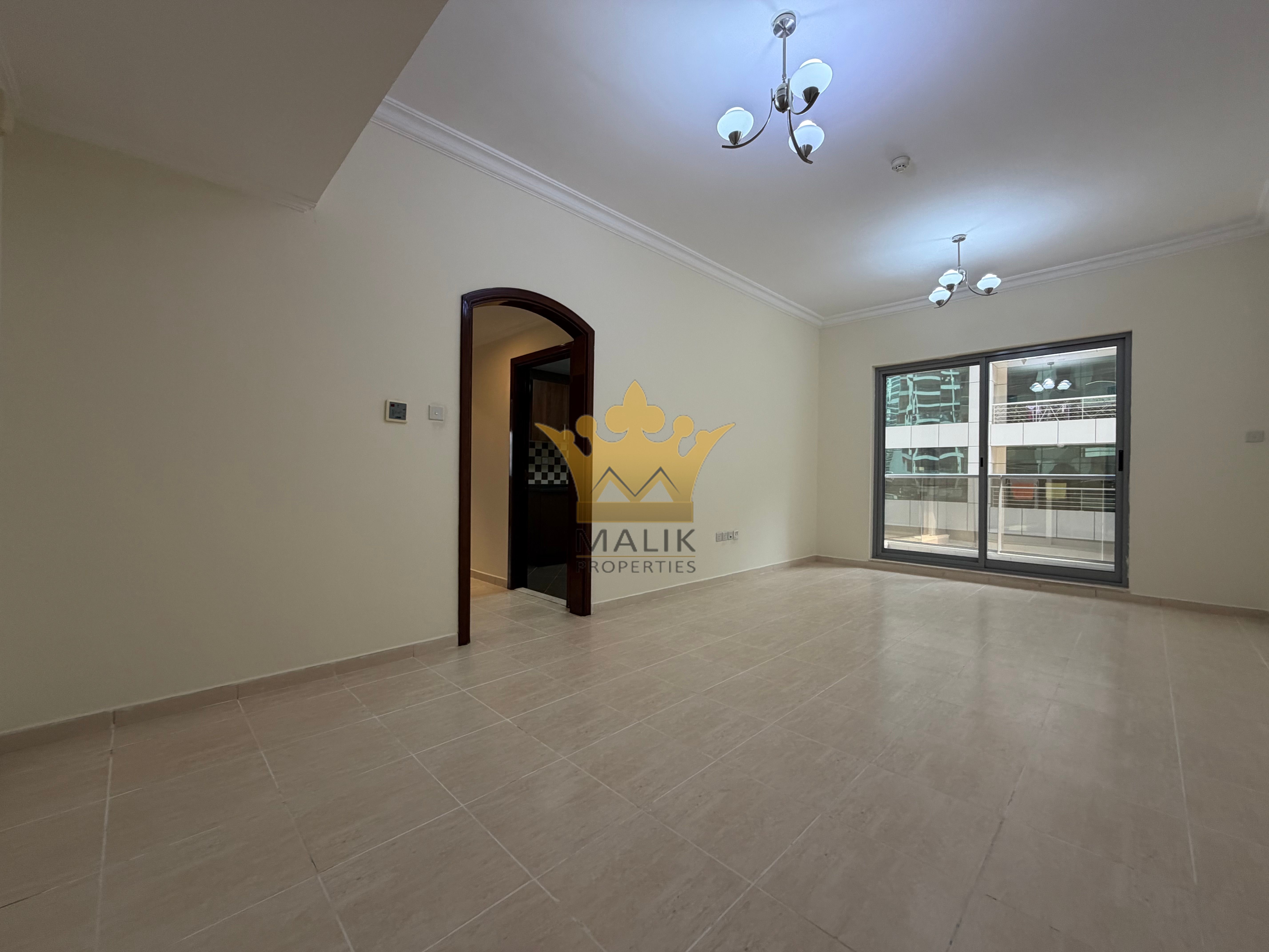 Spacious 1-Bedroom Apartment with Balcony | Pool & Gym Access
