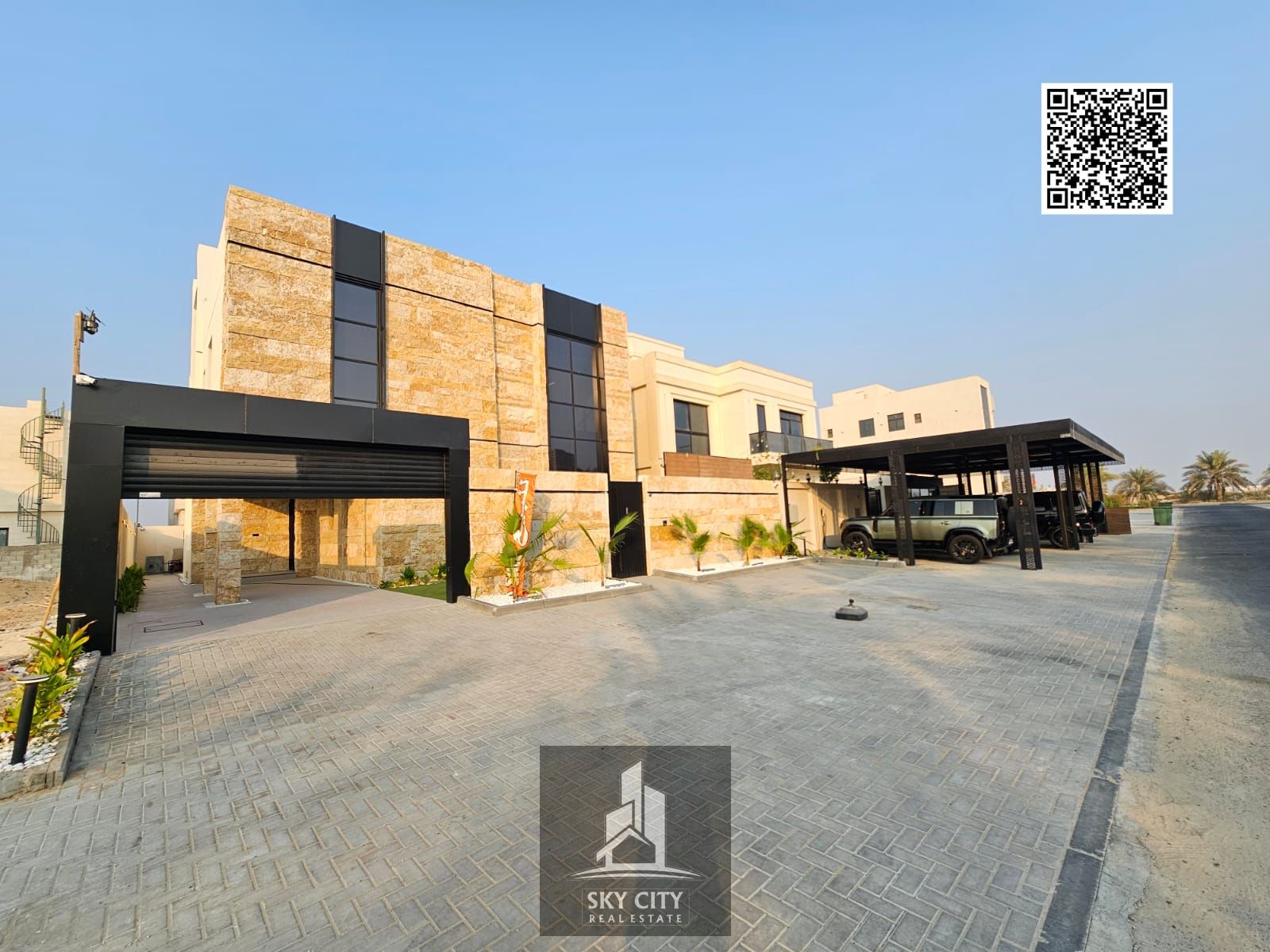 A luxurious, modern villa with a full stone facade and an exceptionally opulent interior featuring high-end hotel-style finishes. Registration and own