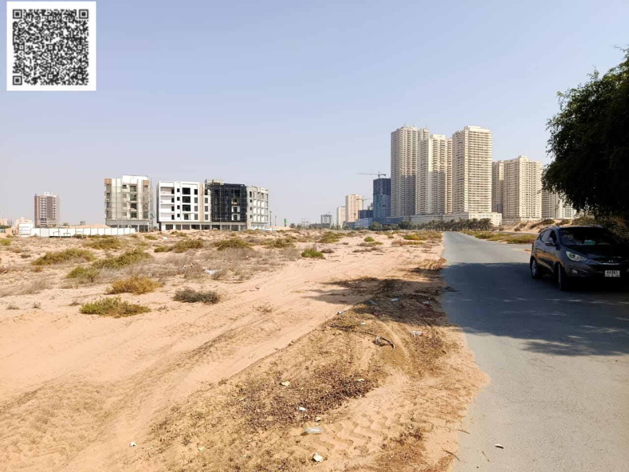 Land for sale. Al Ittihad area - Ajman. The land has access to two streets and an alley. Residential and commercial (ground + 15 floors). Area: 1632 m