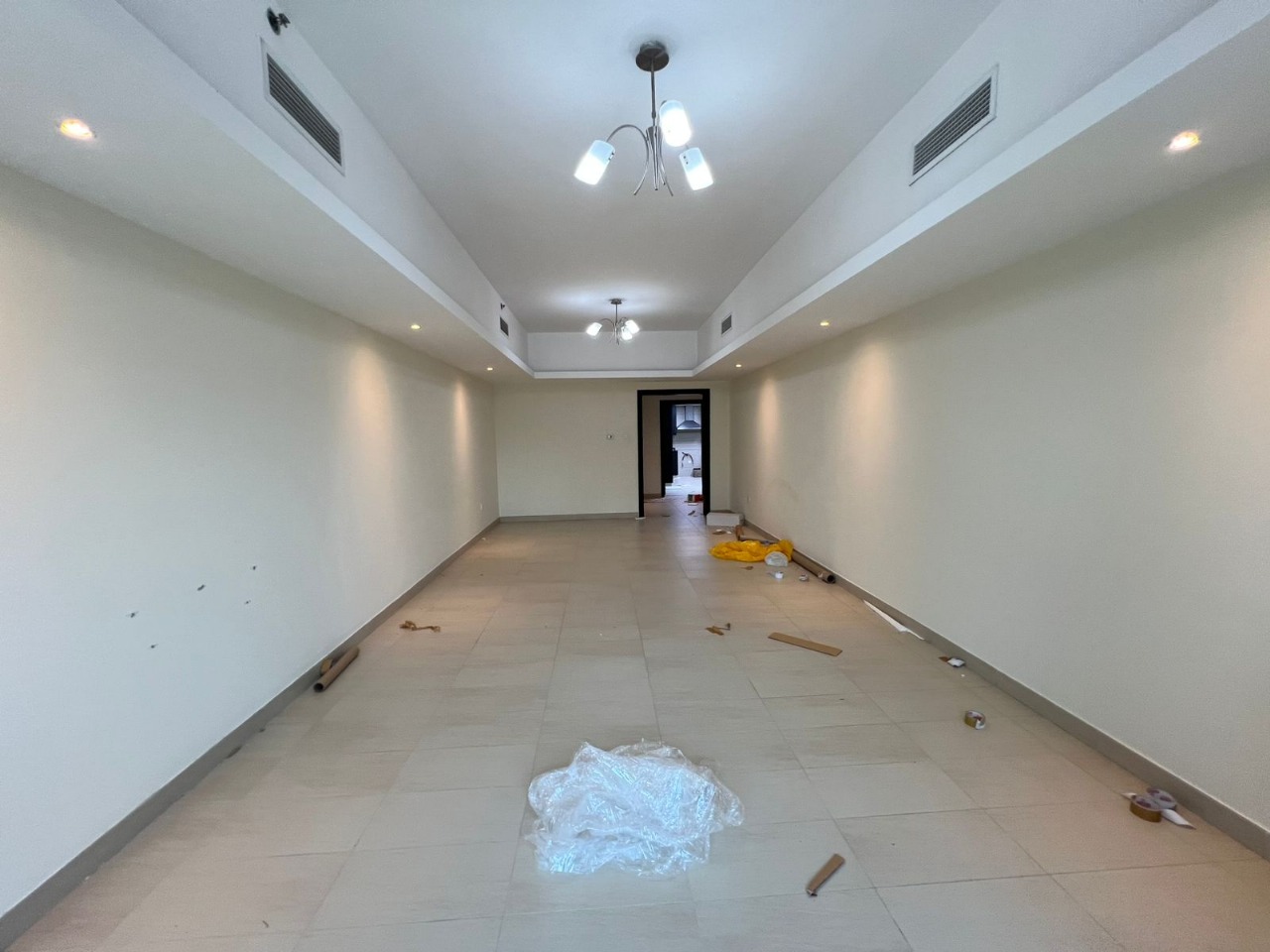 3-bedroom apartment with a living room in Al Qasba, air conditioning included, free parking, gym and swimming pool, upscale tower and spacious areas.