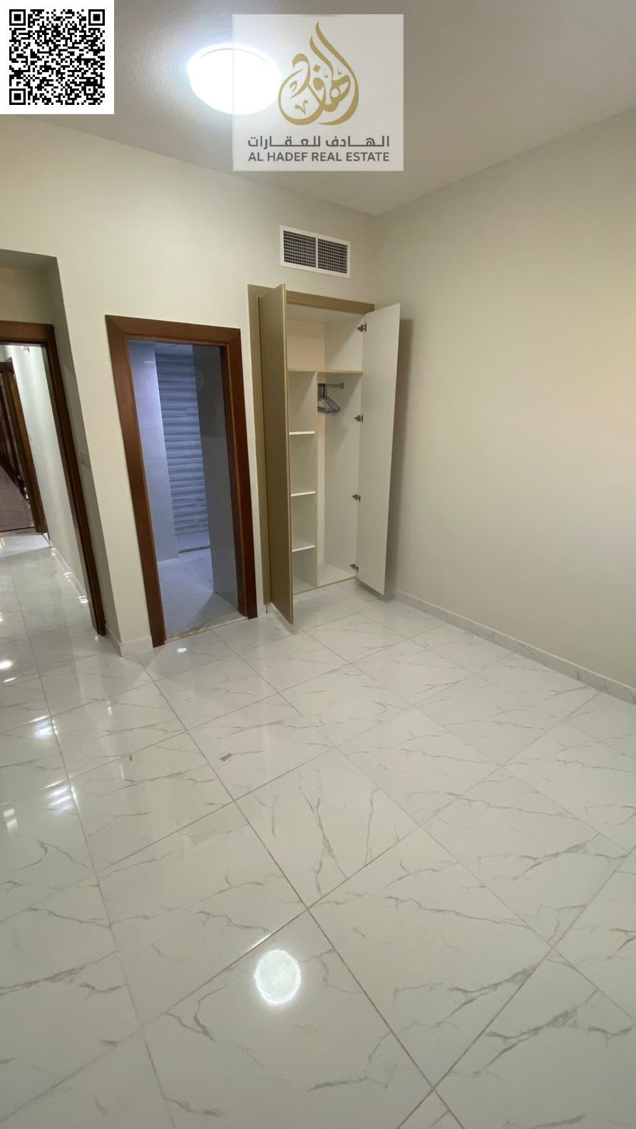 Fully-Furnished 1BHK Apartment with 2 Bathrooms, Spacious Kitchen, Master Bedroom, Private Parking & Central AC for Annual Rent in Al Rawda – Behind