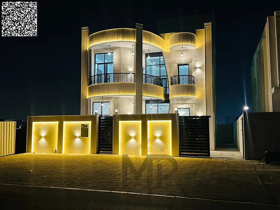 Luxury villa for sale with a distinctive modern design on Sheikh Mohammed Bin Zayed Road. Ground floor, first floor, and rooftop. Registration fees in