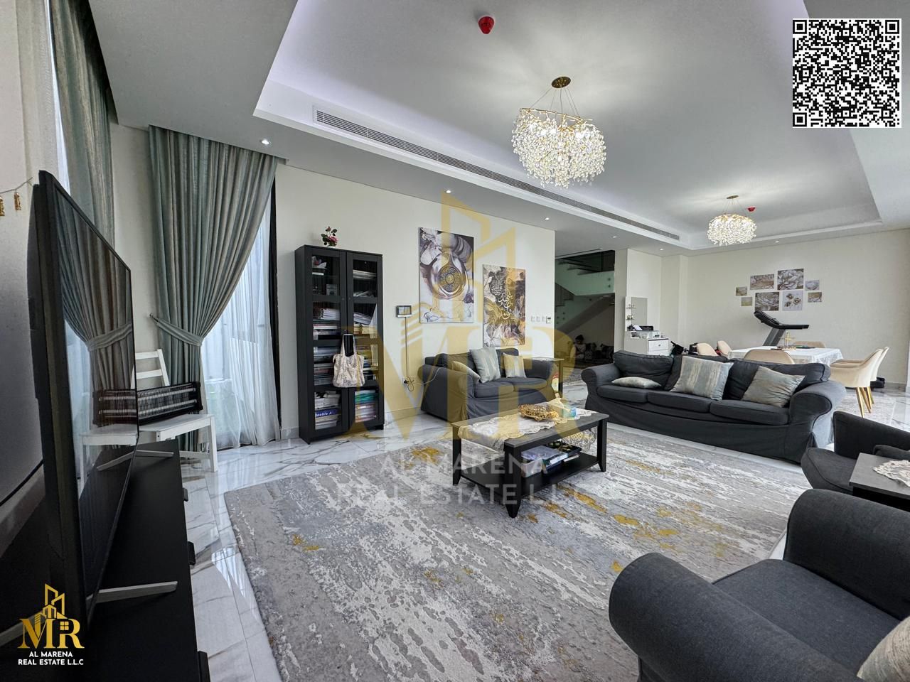 Corner villa in Al Zorah with golf & lake view, 4 bedrooms plus large living room, backyard garden, private pool & kids’ play area.