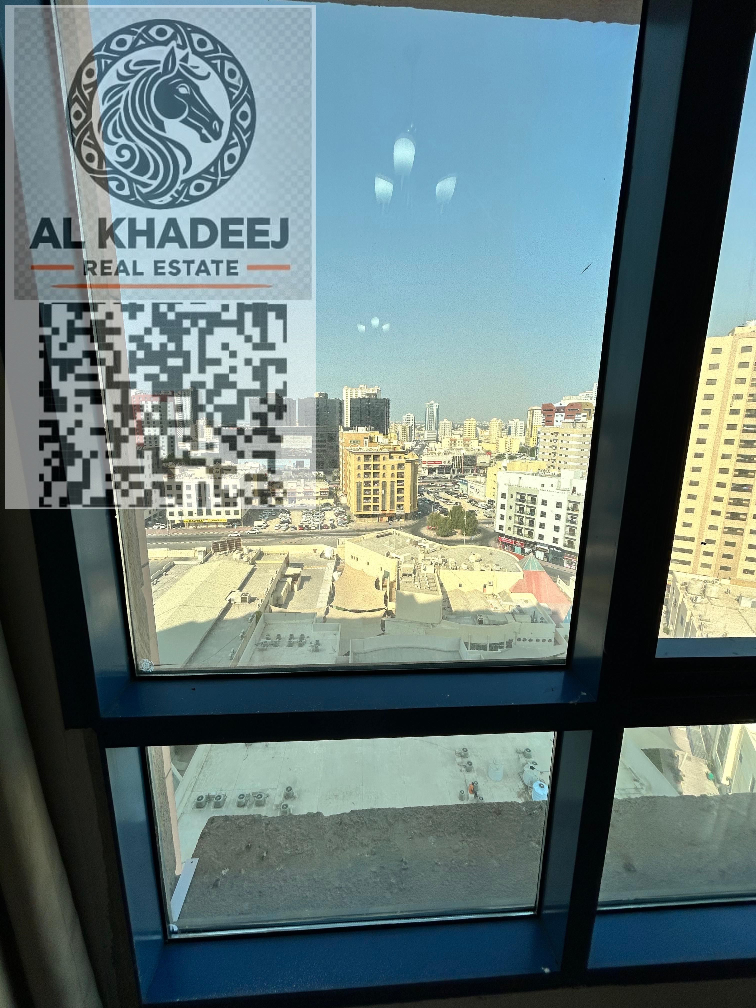 Two-bedroom apartment for sale in Al-Naeema Tower C With an open view overlooking Al-Hikma School and Black Ramada