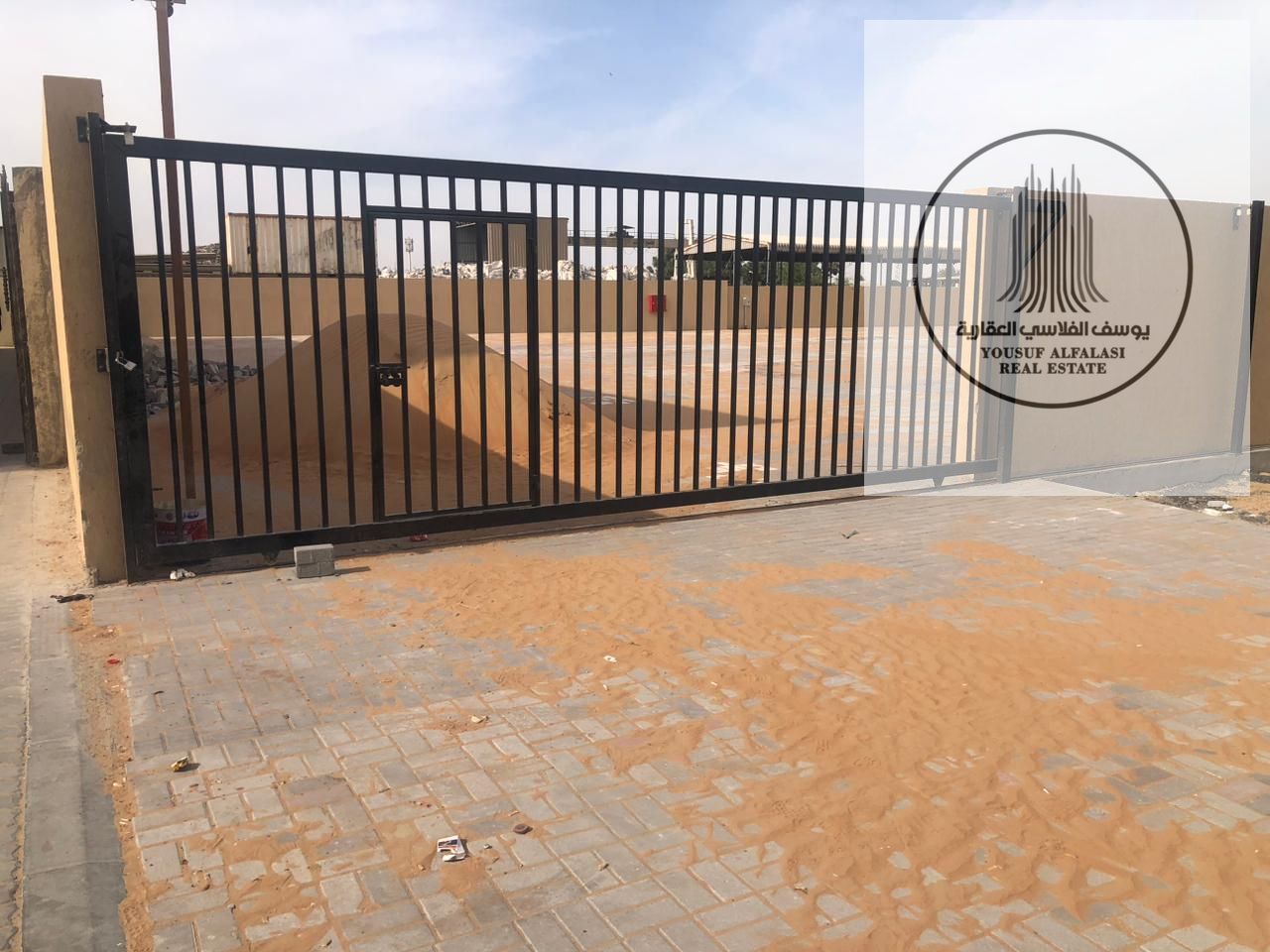 A compound on a main street, 28,000 square feet, 190 kva electricity, interlocking flooring.