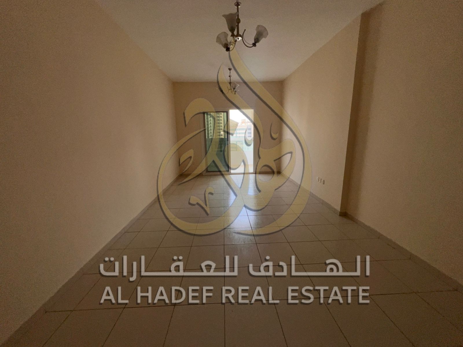 Two-bedroom apartment with a separate living room and balcony with an open view in a prime location in Al Majaz 3