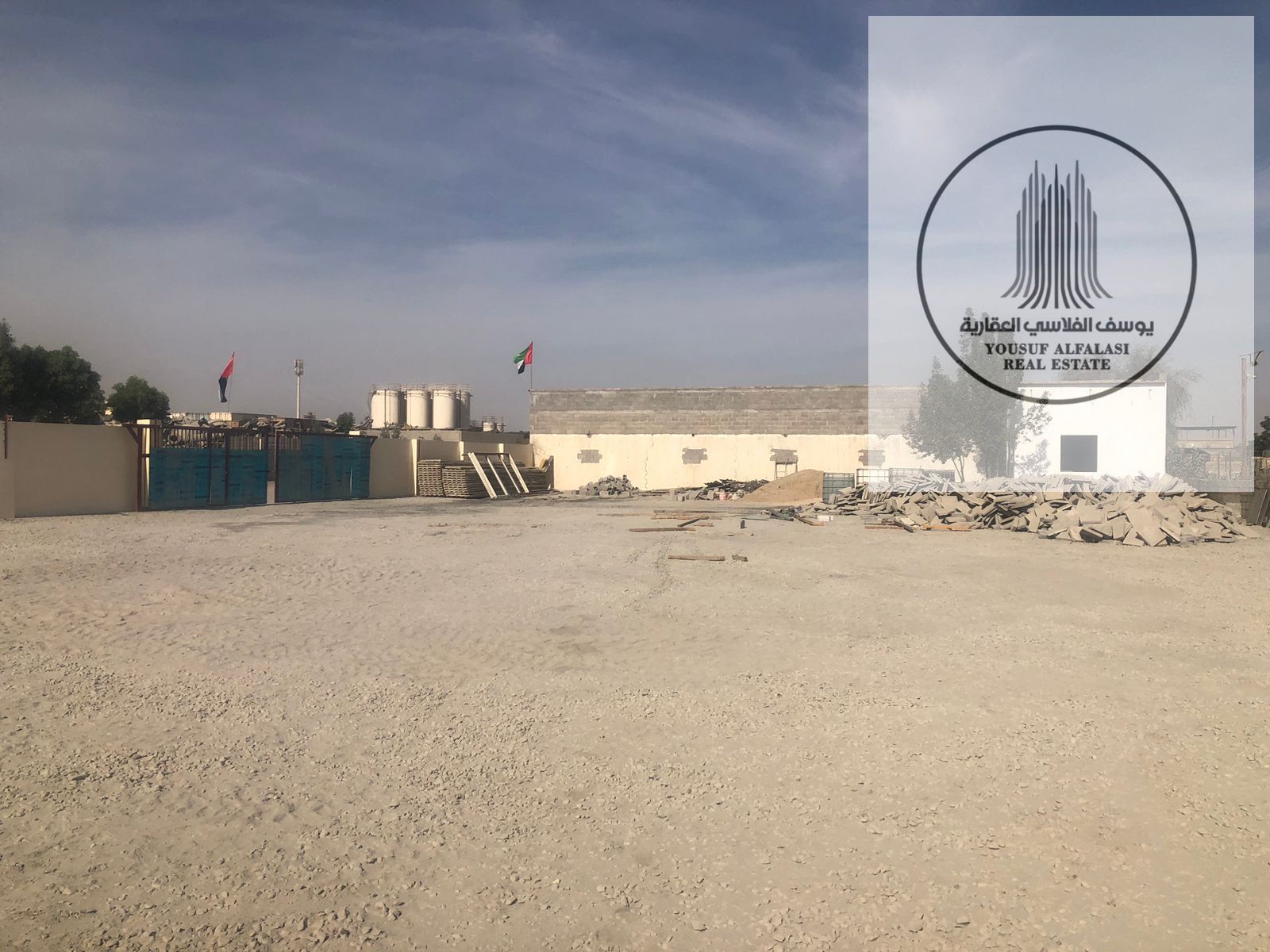 Special Offer for Rent Spacious Yard in a Strategic Location in Al Sajaa Industrial Area with Large Area and New Facilities