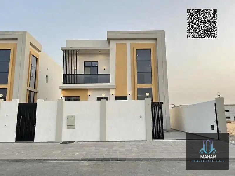 For sale: A luxurious modern villa in Al Helio 2 area – Ajman, featuring an elegant modern design that combines luxury and comfort, and a strategic location close to vital services and facilities in one of the best quiet residential areas.