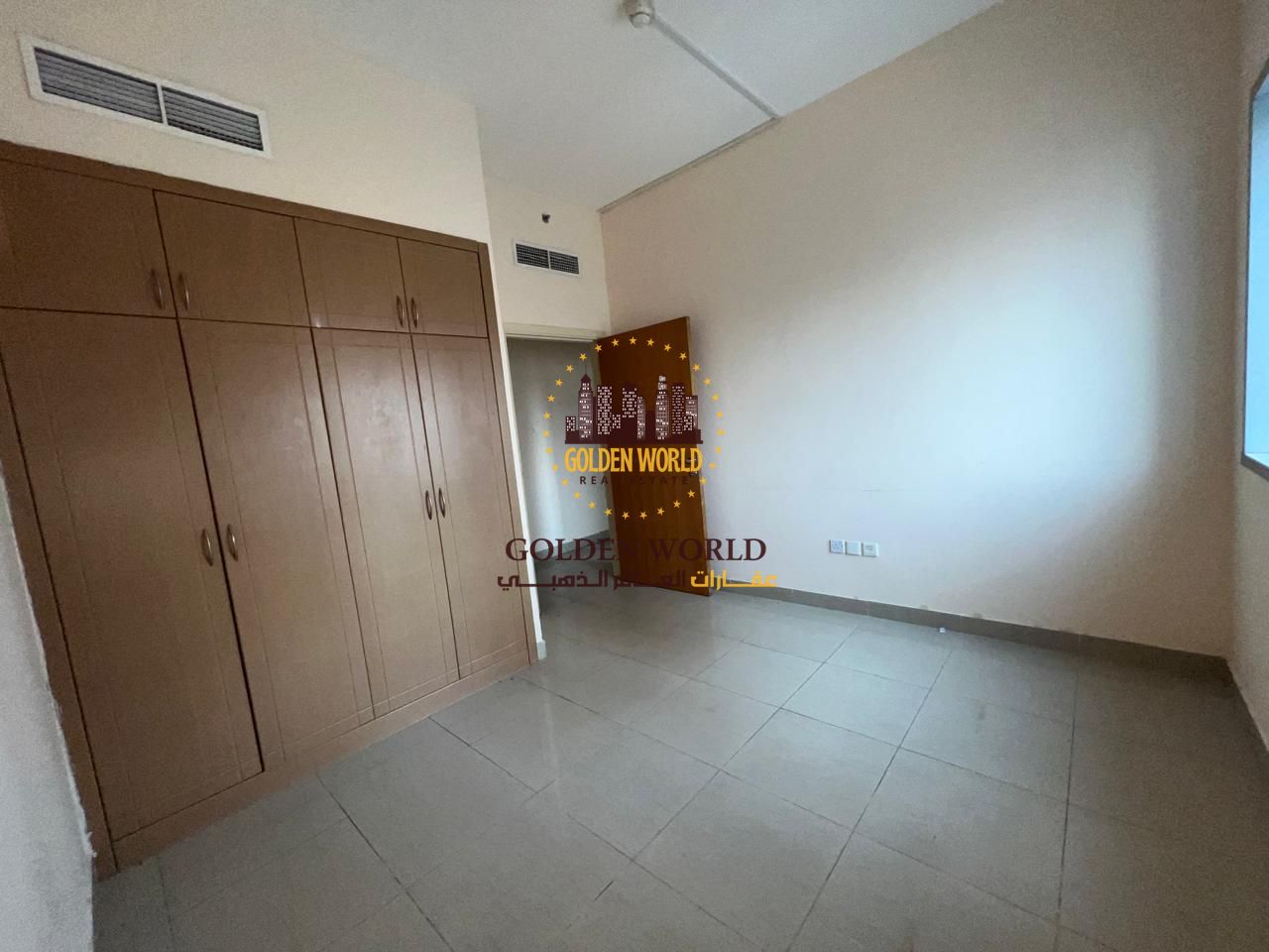 Excellent apartment in Al Qasimiya: Two bedrooms and a spacious living room with a balcony and an open view. Includes two bathrooms and built-in wardr