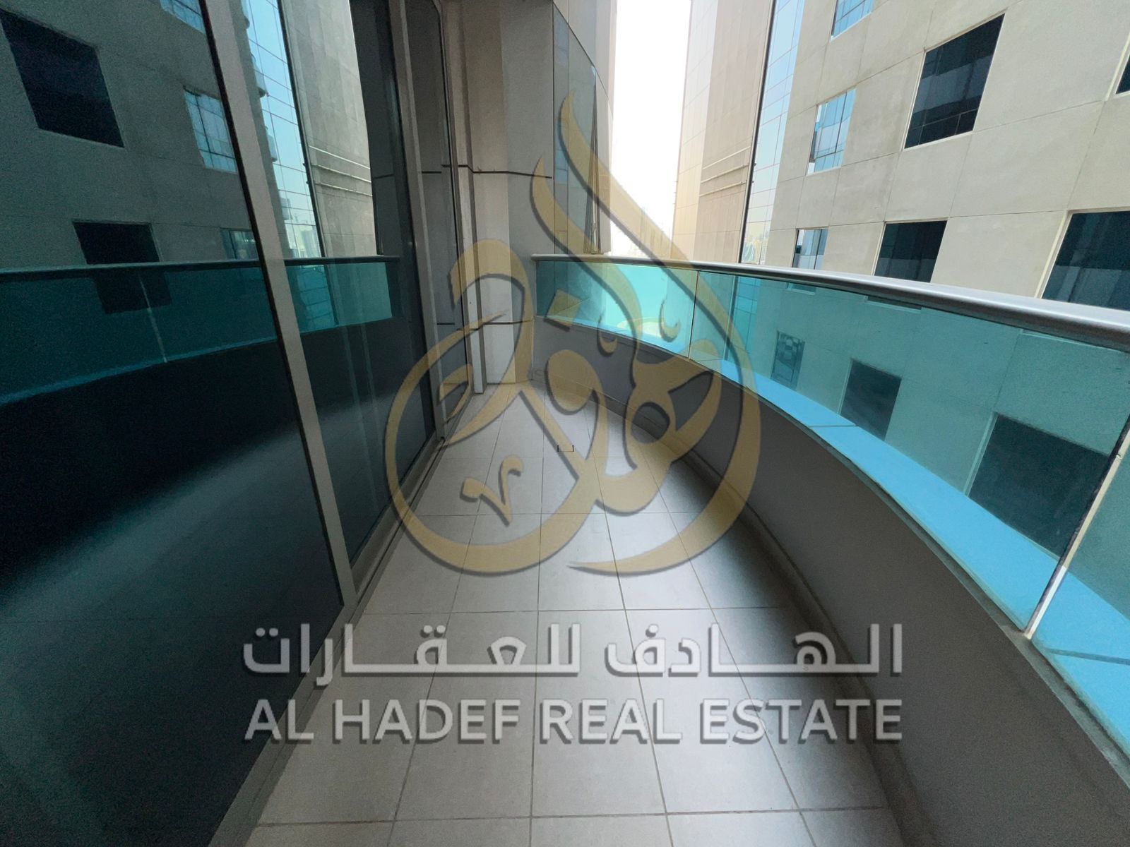 For rent in Sharjah, Al Majaz 3, a distinctive two-bedroom apartment with a living room, featuring spacious areas and a full sea view from the balcony