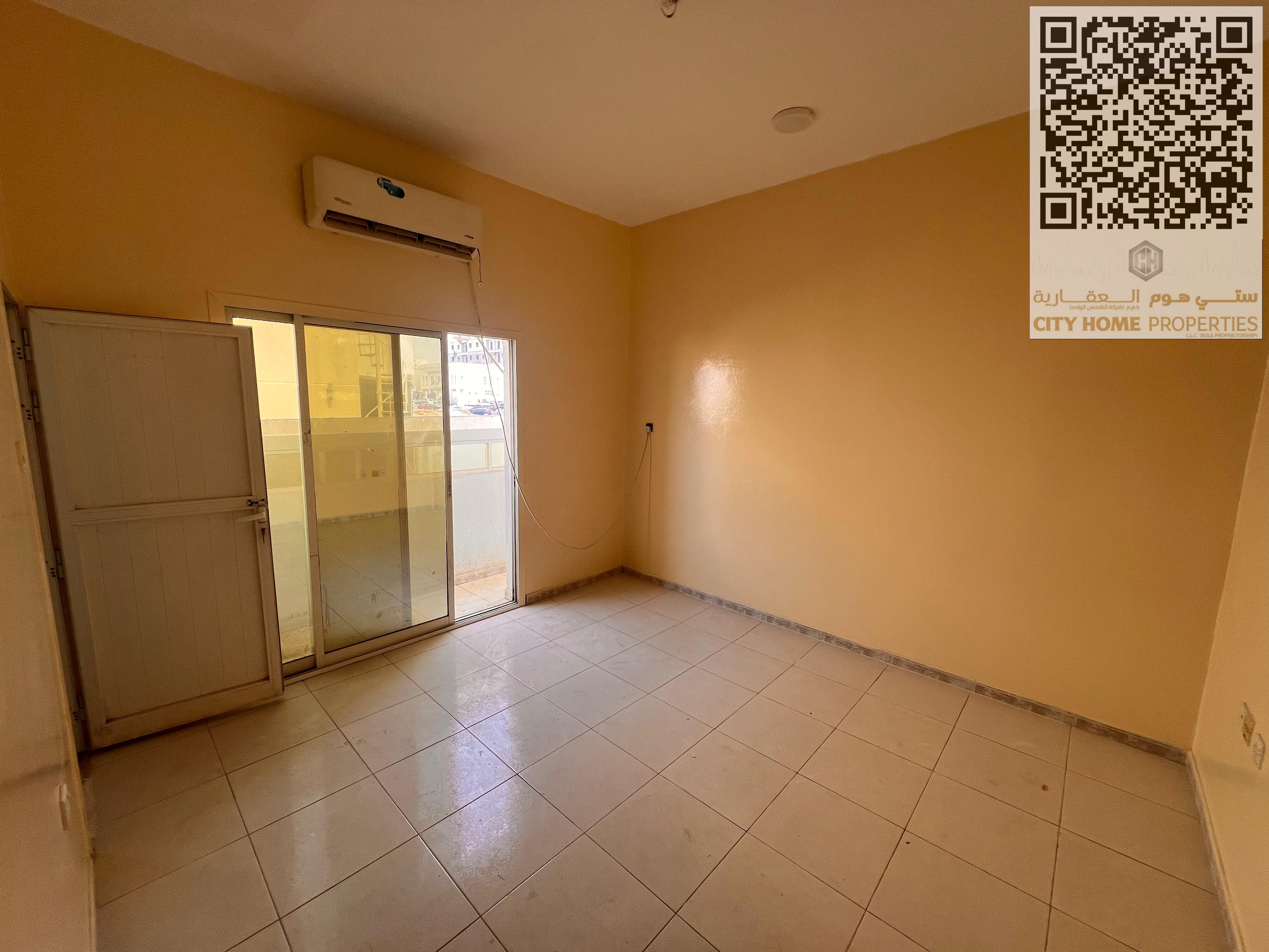 : Spacious 2-Bedroom Apartment with 2 Bathrooms, Separate Living Room, Balcony, Split AC, Wide Layout, Prime Location in Al Muwaileh 2 Next to Omar St