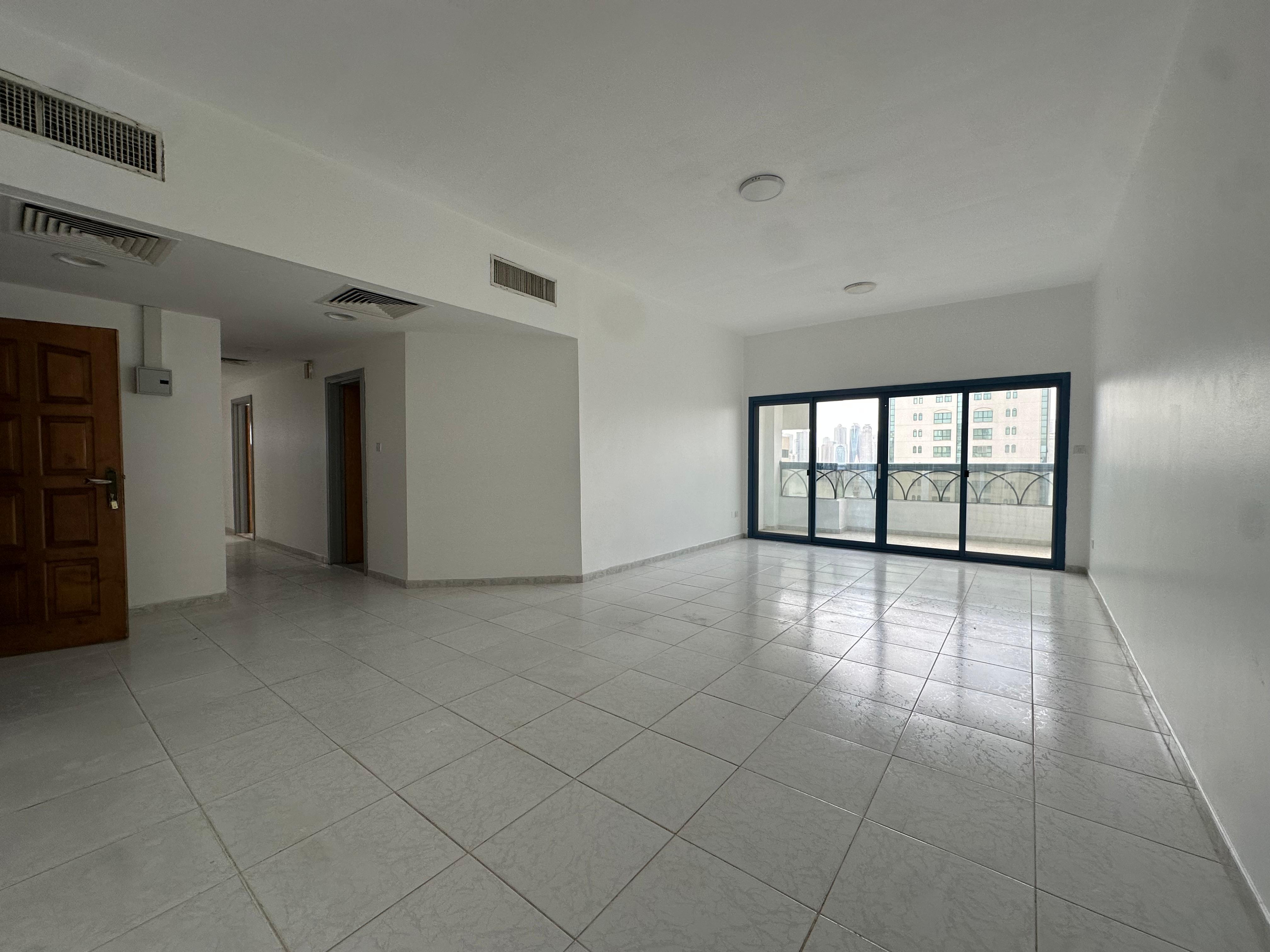 A three-bedroom apartment in Al Majaz 1 with free AC, balcony, wide spaces, clean finishing, and ready-to-move maintenance. Annual rent is 63,000 AED.