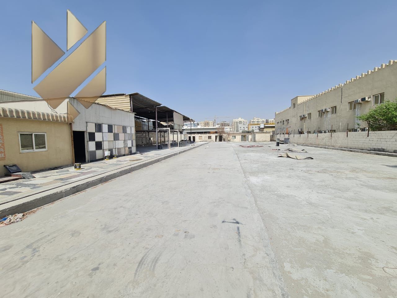 Industrial Property for Sale in Industrial Area 17 – Open Yard, Warehouses, Worker Accommodation, and Full Facilities