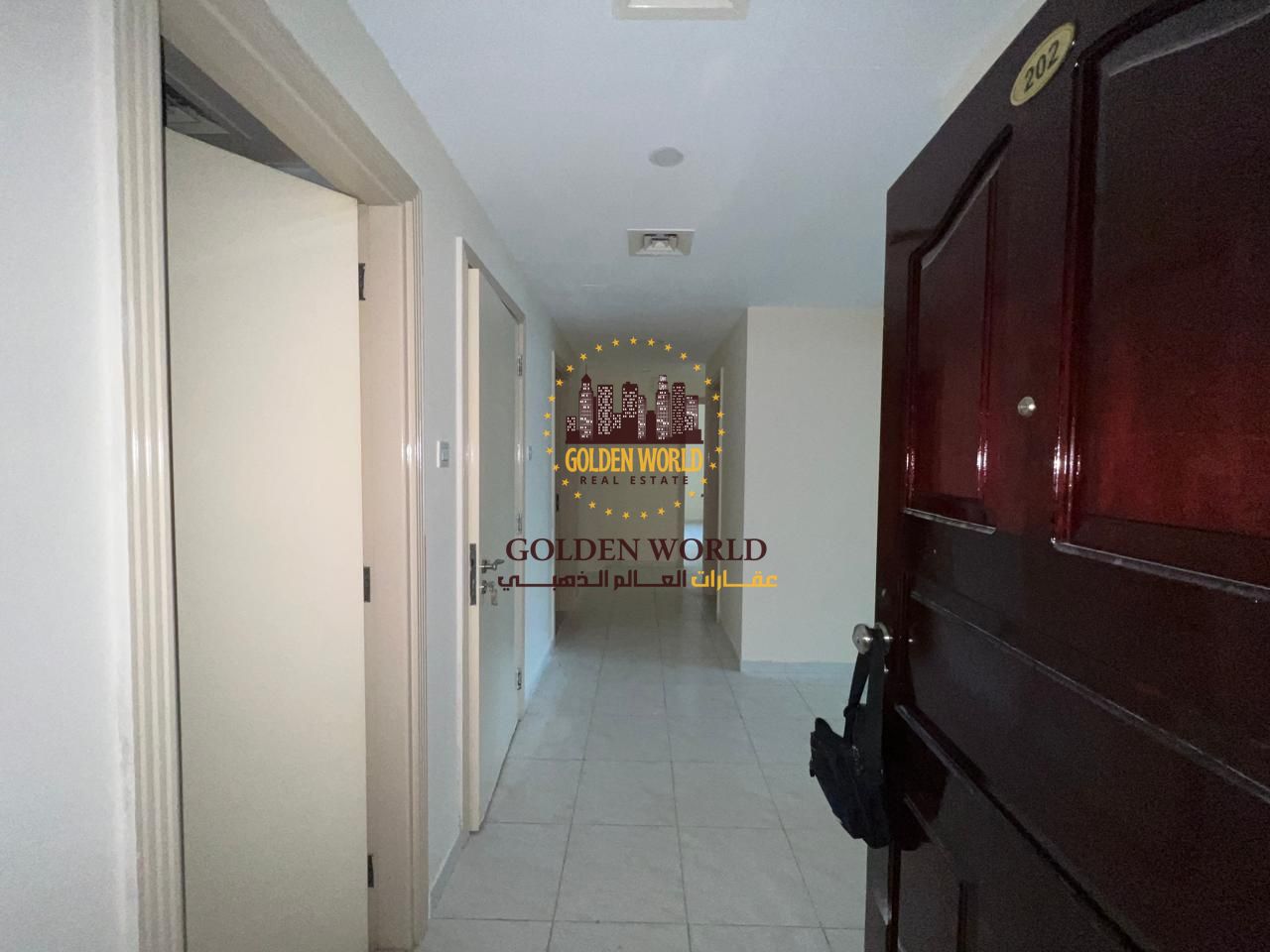 3BR apartment with living room, balcony, 3 baths, laundry, store room, built-in wardrobes & parking in Al Taawun. Rent 65,000 AED/year.