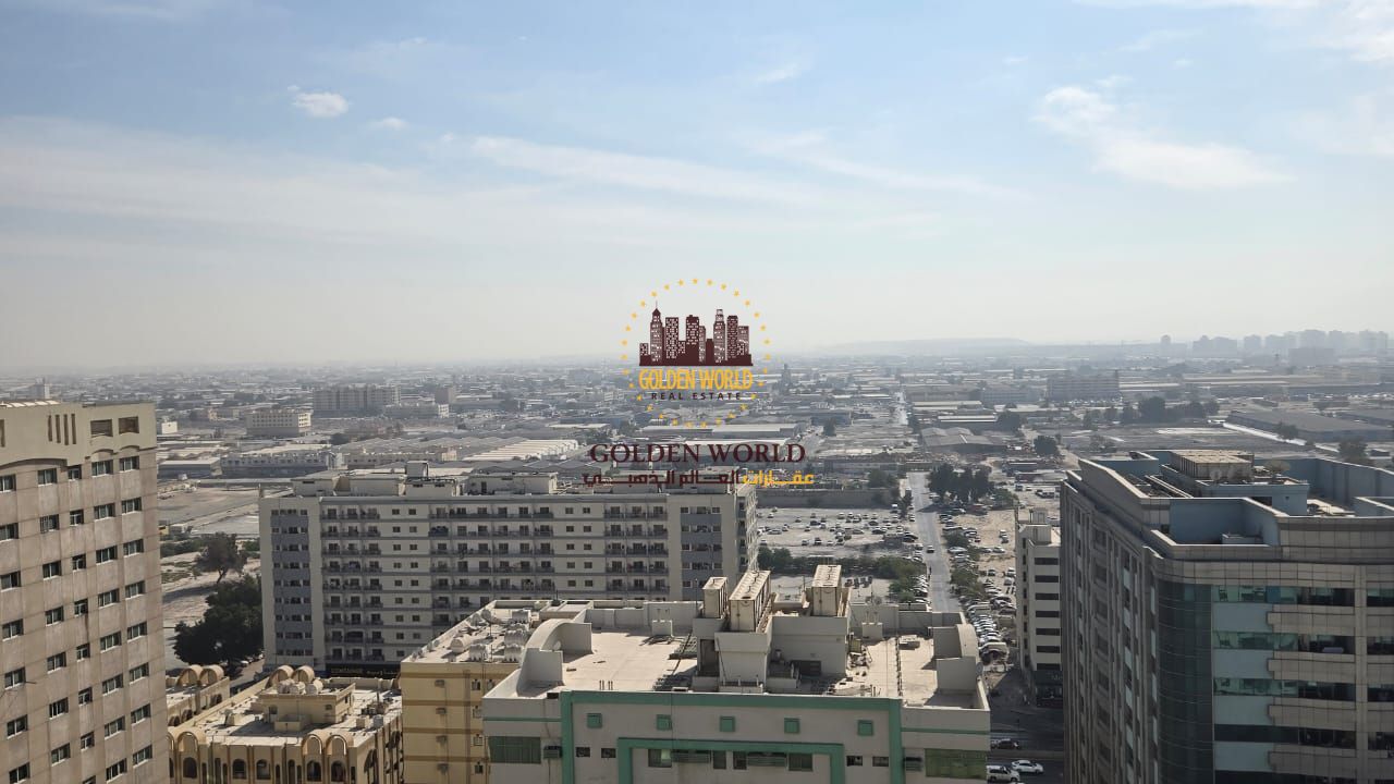 Apartment for rent in Al Majaz 2, 2BR + living room, 2 balconies + kitchen balcony, open view, parking. Price: 52,000 AED.