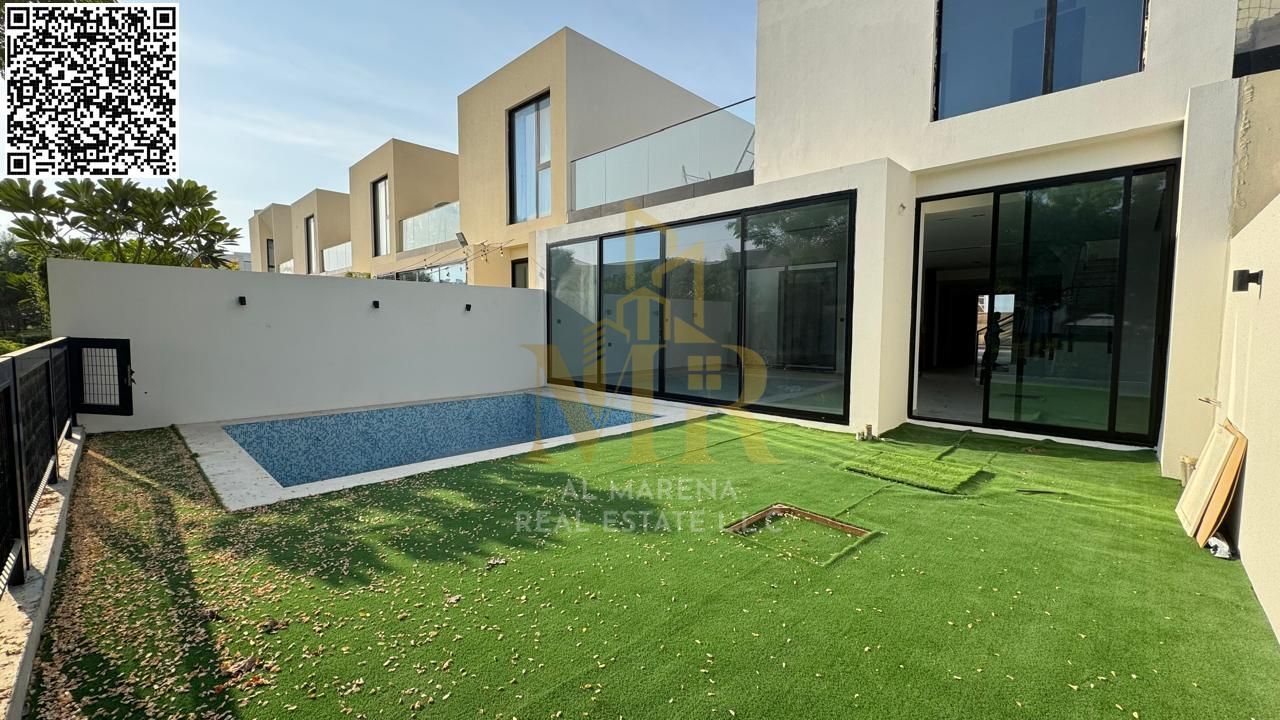 A luxurious villa in Al Zorah, boasting a prime location and breathtaking views, complete with a swimming pool and air conditioning included. An ideal