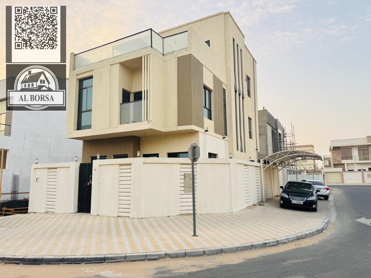For sale in Al Zahia, a corner townhouse, two floors and a roof, 7 master bedrooms, a living room and majlis.