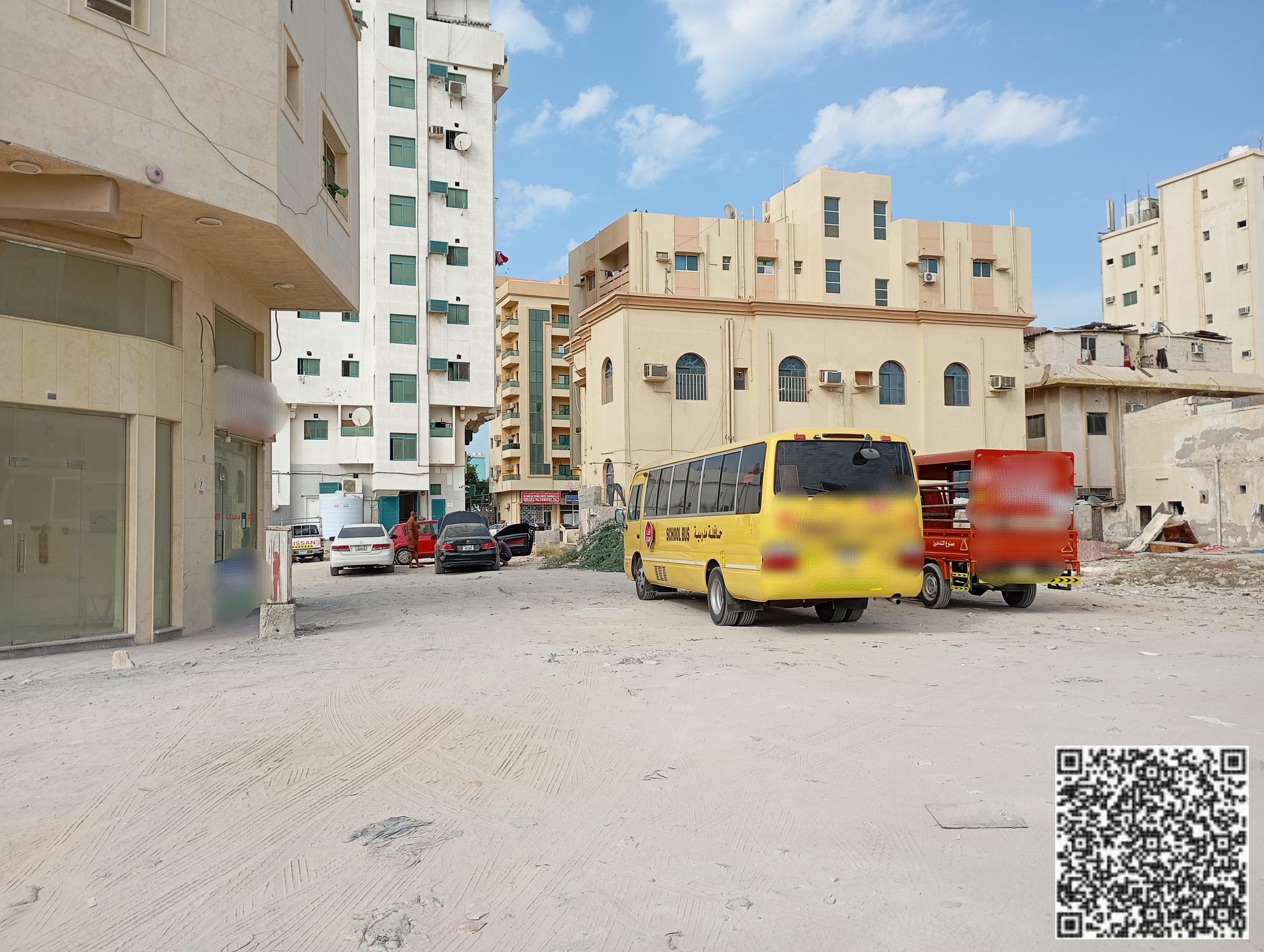 Residential–commercial plot near Ajman Walkway, located on a street and alley, third plot from the main road.