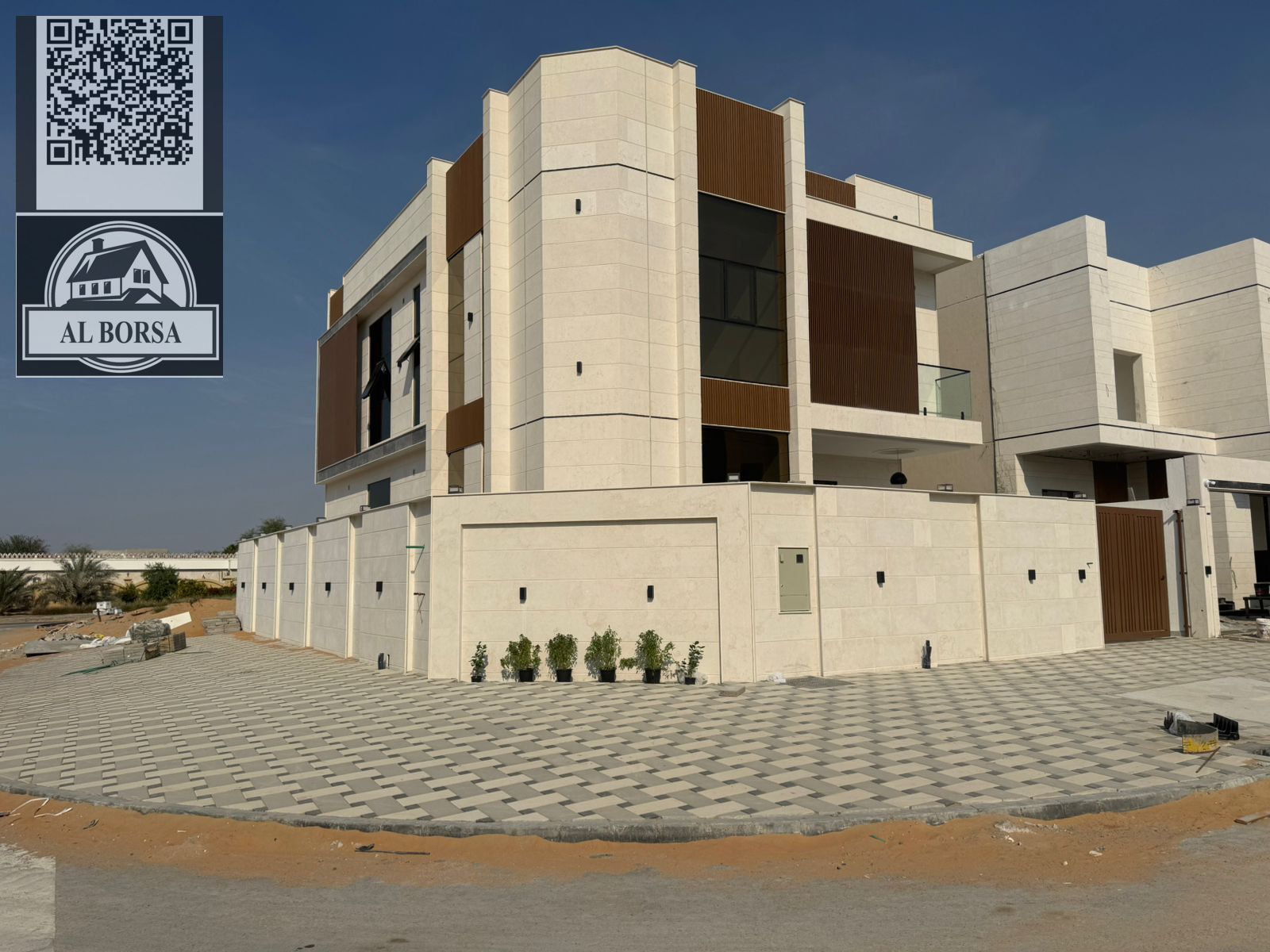 Villa for sale in Al Helio 2, Ajman. 5 master bedrooms, majlis, living room, and maid's room.