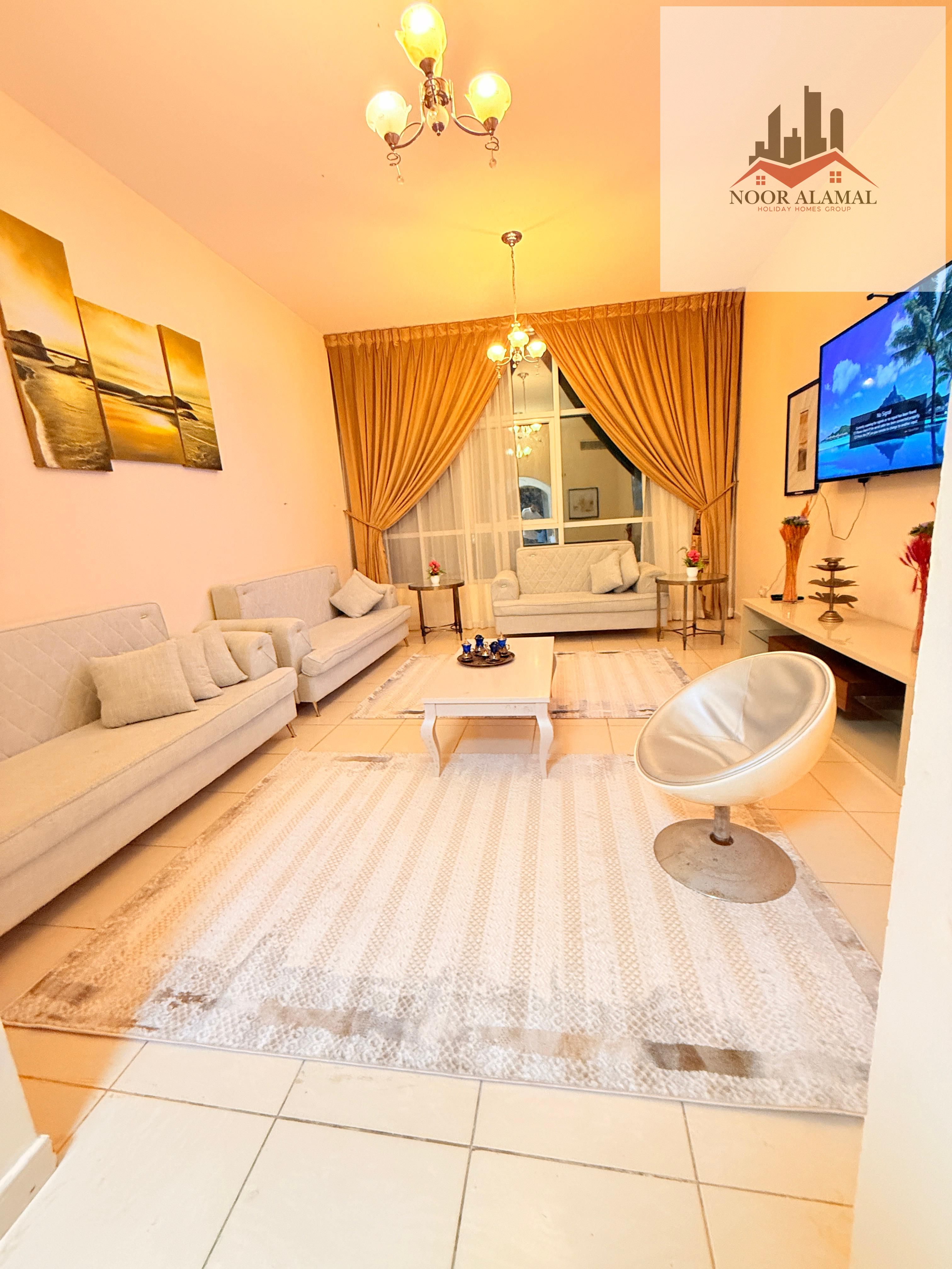 Sharjah - Alkhan - Apartment with one bedroom, a hall, a kitchen, and two bathrooms